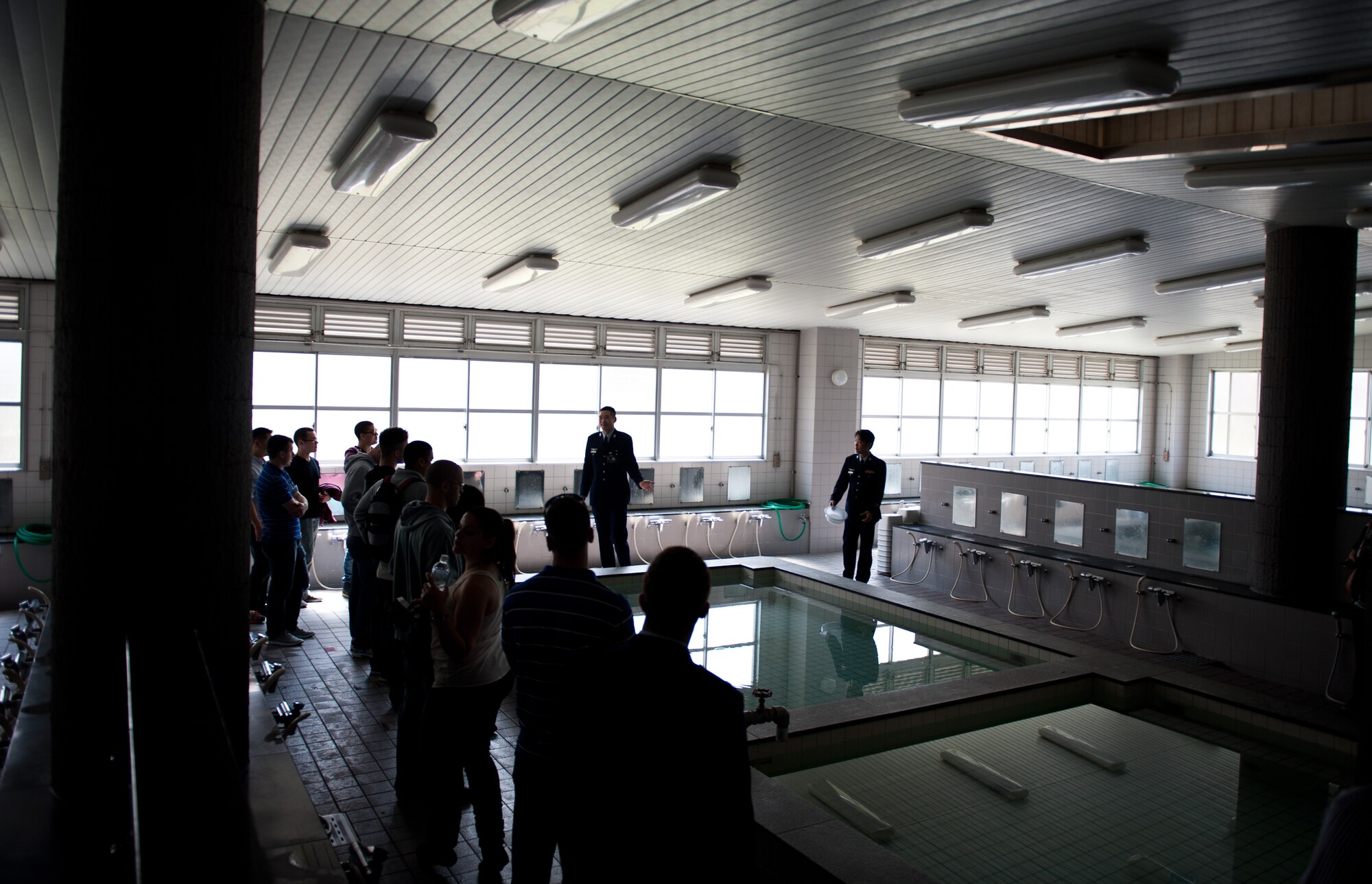 Airmen from Yokota Air Base, Japan, tour a bathing facility April 7, 2013, during a visit to Kumagaya Air Base, Japan. Throughout the tour, the Yokota Airmen saw many cultural differences between the U.S. and Japan, one of them being the approach to bathing. More than 1,000 JASDF service members use the facility on a daily basis. (U.S. Air Force photo by Senior Airman Cody H. Ramirez)