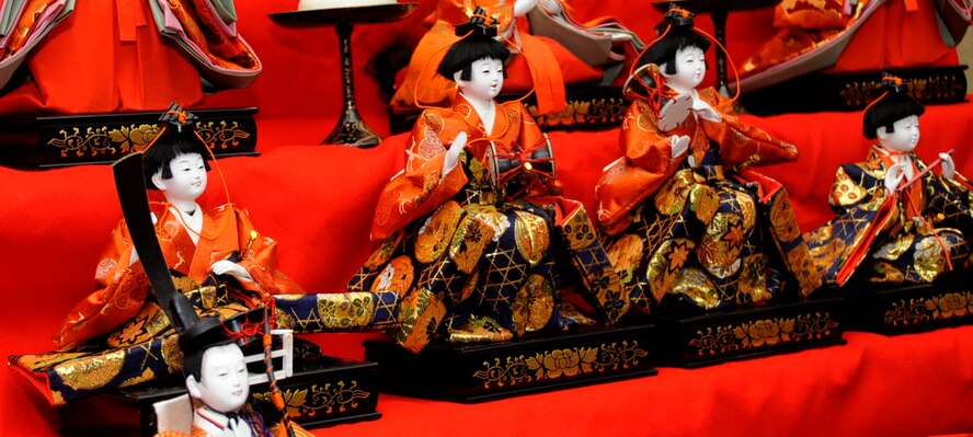 Porcelain Japanese dolls are displayed during the 26th annual Japan Day celebration at the Misawa Air Base Collocated Club April 6, 2013. The event gives base residents the opportunity to experience Japanese culture in their own backyard. (U.S. Air Force photo by Airman 1st Class Kenna Jackson)