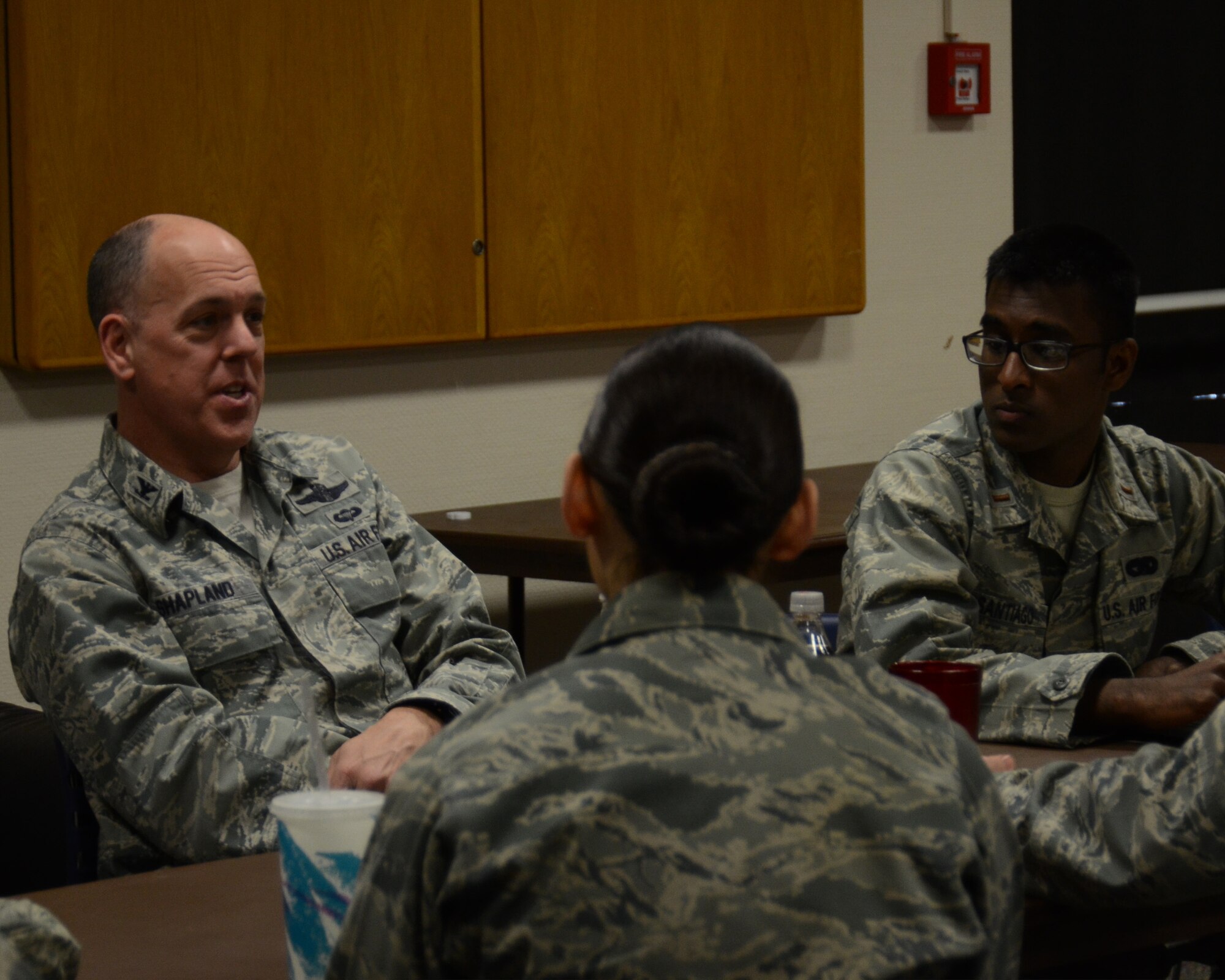 Col. John Shapland, 435th Air Ground Operations Wing commander, speaks to members of the Kaiserslautern Military Community Company Grade Officers' Council at Ramstein Air Base, Germany, April 4, 2013. Shapland shared his AIr Force story and provided mentorship to more than 20 CGOs during the professional development event. (U.S. Air Force photo / 2nd Lt. Kay M. Nissen)