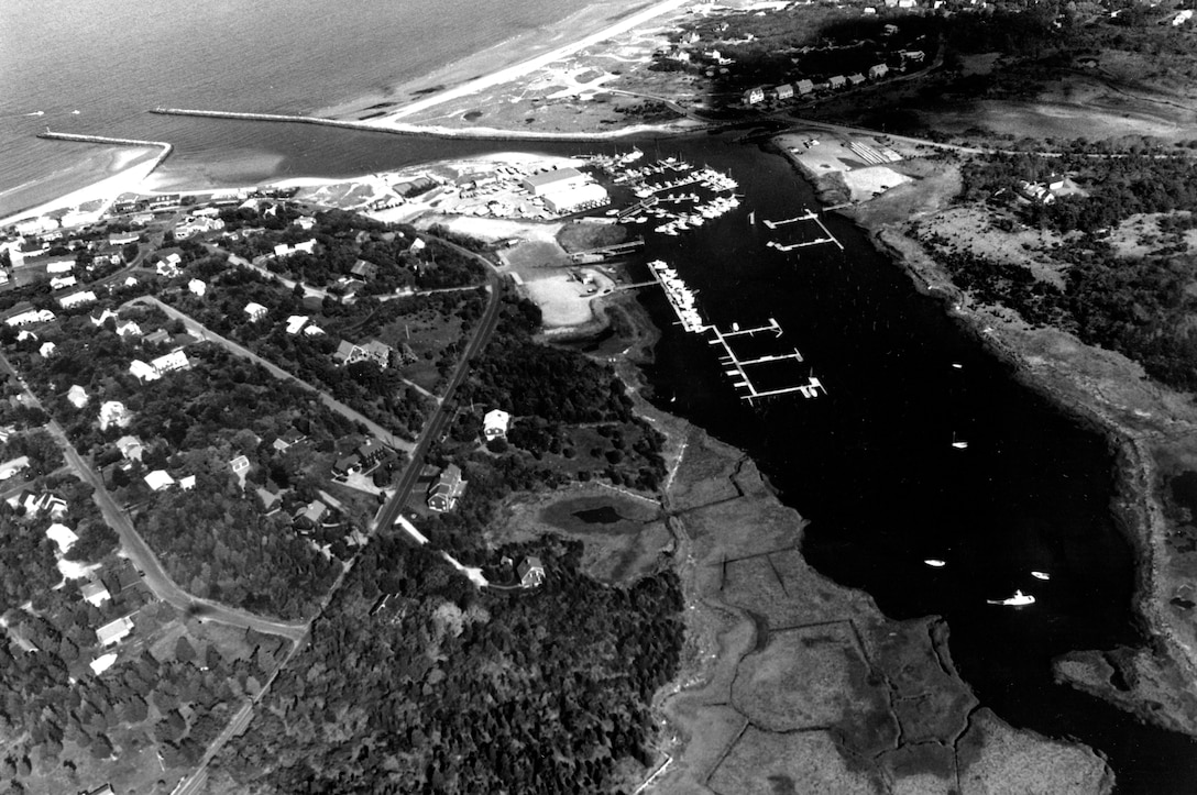 Aerial view of Sesuit Harbor. Sesuit Harbor is located in Dennis,MA, about 85 miles southeast of Boston Harbor. Photo was taken in Nov. 1987.