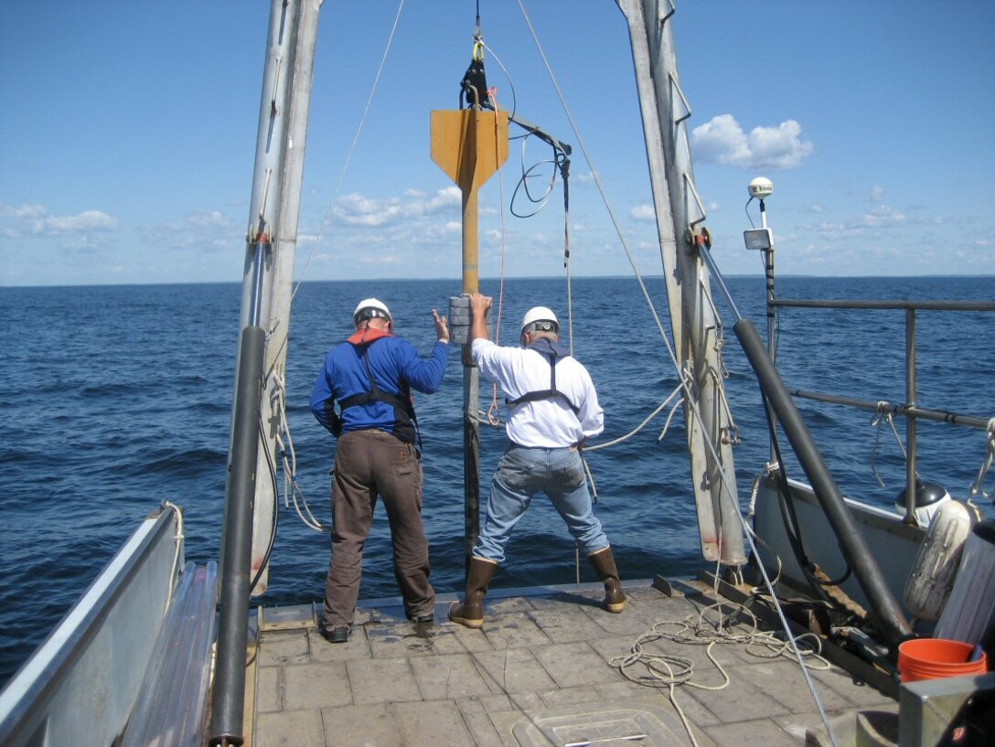 Gravity corer about to be deployed for sediment core collection during a disposal site monitoring survey.