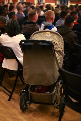A baby stroller rests in a row of chairs during a pre-deployment meeting held by Combat Logistics Battalion 6, 2nd Marine Logistics Group aboard Camp Lejeune, N.C., April 4, 2013. The battalion hosted the meeting to answer questions about its upcoming deployment to Afghanistan and introduced family members to their support network within the unit.