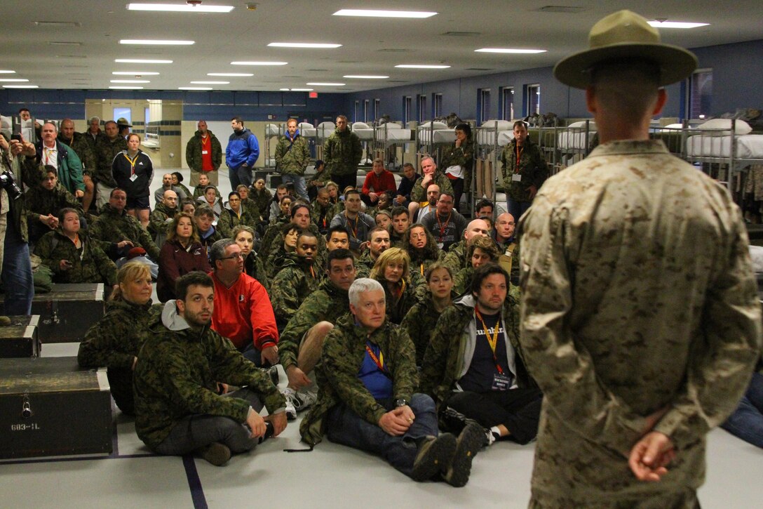 New York, Vermont, Rhode Island, Connecticut and Massachusetts, educators taking part in the Educators Workshop ask drill instructors questions about Marine Corps Boot Camp on Marine Corps Recruit Depot Parris Island, S.C., April 3, 2013. The workshop brings together teachers, administrators and other education professionals aboard the depot and gives them the opportunity to experience what recruit training is like in the Corps. (U.S. Marine Corps photo by Sgt. Richard Blumenstein)
