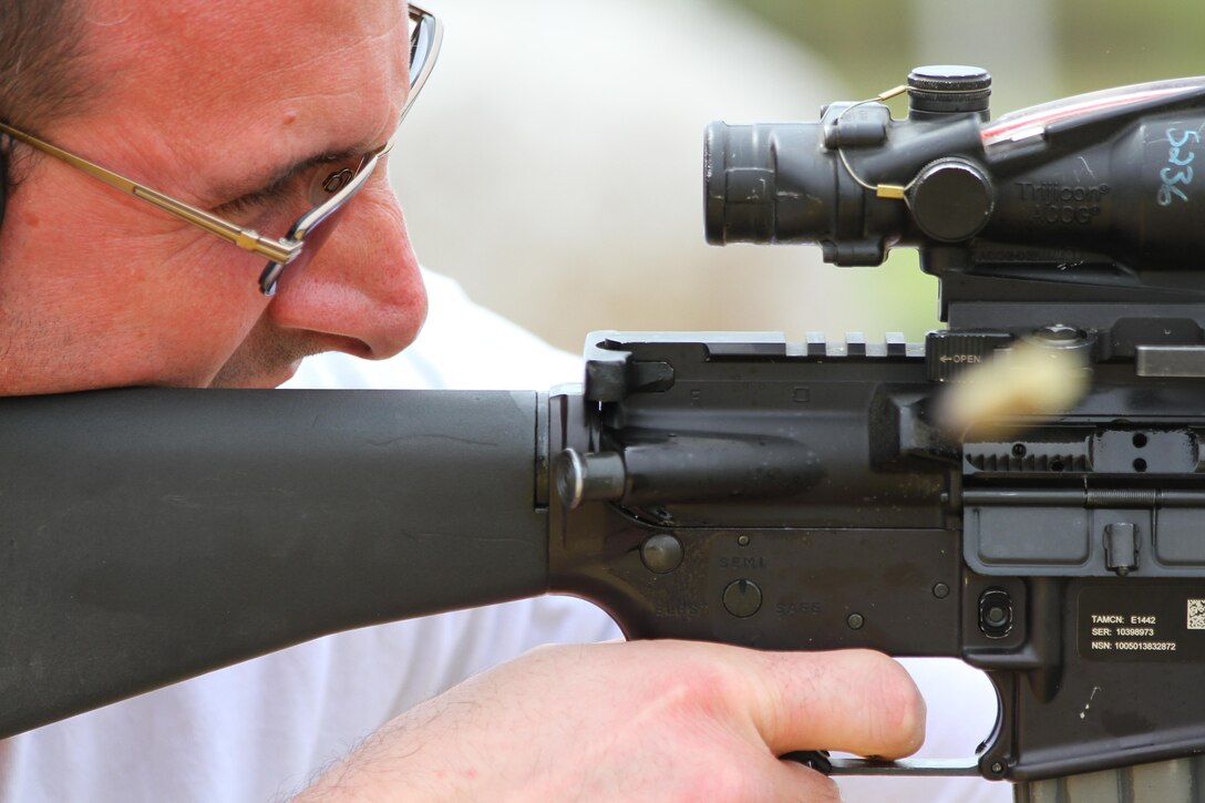 Robert Nave, a teacher from Terryville High School in Terryville, Conn., shoots an M16-AF rifle while taking part in the Educators Workshop on Marine Corps Recruit Depot Parris Island, S.C., April 3, 2013. The workshop brings together teachers, administrators and other education professionals aboard the depot and gives them the opportunity to experience what recruit training is like in the Corps. (U.S. Marine Corps photo by Sgt. Richard Blumenstein)