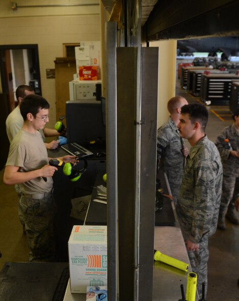 Senior Airman Hugo ZuegarGarcia, 2nd Maintenance Squadron Support Section, scans equipment on Air Force Base, La., April 9, 2013. Airmen in the support section use TCMaxx to track all tools in storage and in use by maintenance Airmen. (U.S. Air Force photo/Senior Airman Micaiah Anthony)