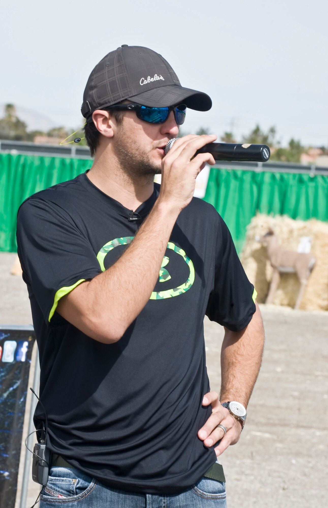 Luke Bryan, American country music singer, gives opening remarks during the Academy of Country Music and Cabela’s Great Outdoors Archery Event April 6, 2013, in Las Vegas. Bryan is the co-host of the 48th Annual Academy of Country Music Awards. (U.S. Air Force photo by Senior Airman Matthew Lancaster)