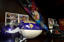 Autographed souvenirs from Super Bowl XLV sit on the desk of U.S. Air Force Senior Master Sgt. Robert Drown, 20th Security Forces Squadron logistics superintendent at Shaw Air Force Base, S.C., March 25, 2013.  Drown, accompanied by his wife Sheila, was the winner of the Football Frenzy, a 20th Force Support Squadron and Air Force Clubs sponsored event.    The raffle had more than 20,000 applicants and he was one of four to be selected to enjoy an all-expenses paid trip to the game.  (U.S. Air Force photo by Airman 1st Class Nicole Sikorski/Released)