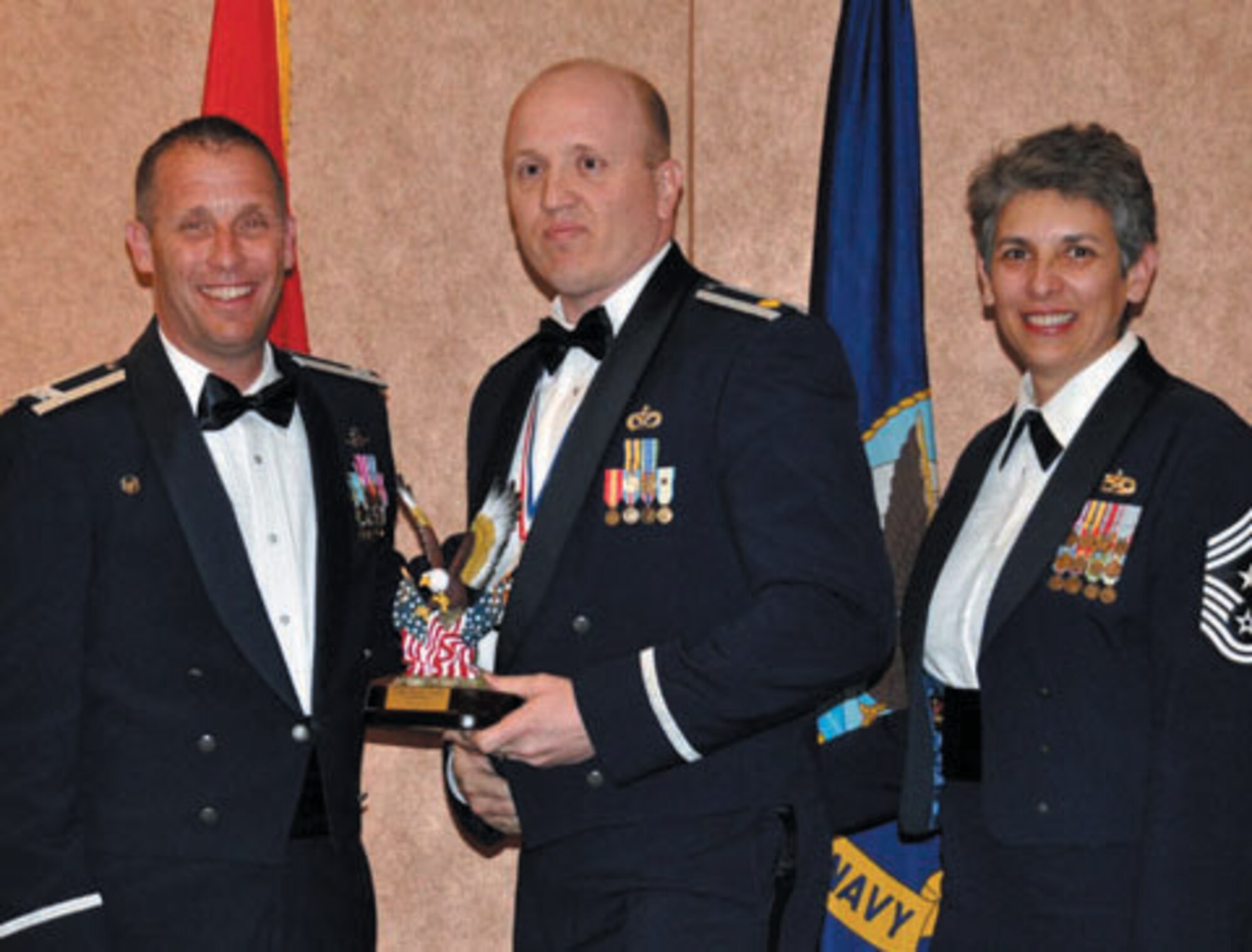 TRAVIS AIR FORCE BASE, Calif. -- Capt. Shane Lynch with the 349th Civil Engineering Squadron received the Company Grade Officer of the Year award for the 349th Air Mobility Wing, March 23, 2013. (U.S. Air Force photo by Senior Airman Cindy G. Alejandrez)