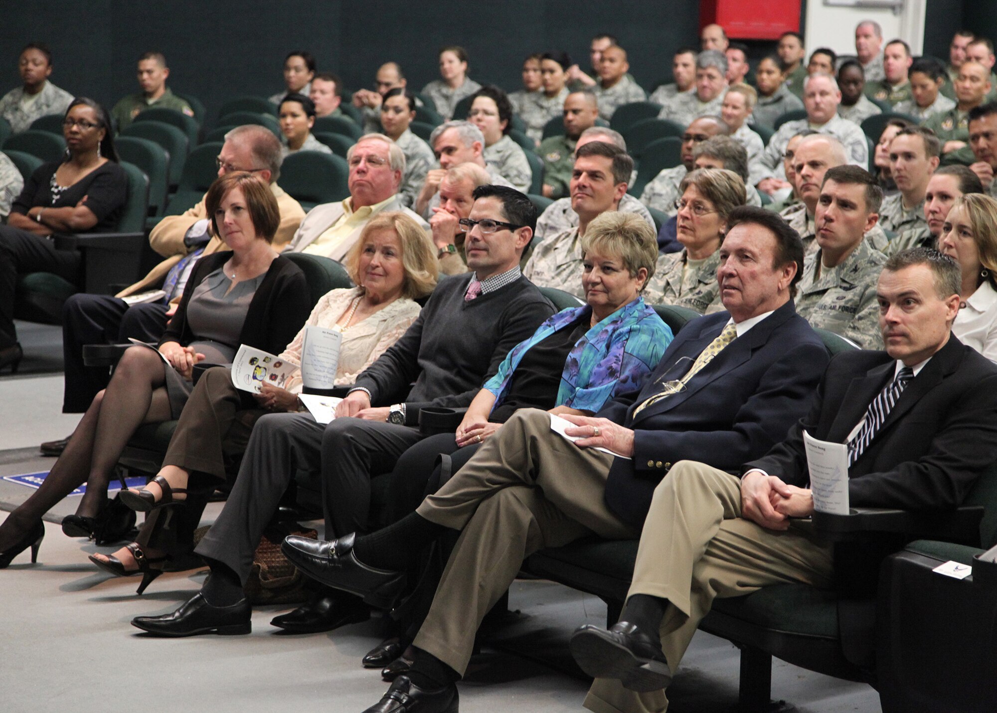 TRAVIS AIR FORCE BASE, Calif. -- Guests at the ceremony in which Col. Scott L. McLaughlin assumed command of the 349th Operations Group at Travis Air Force Base, Calif., April 7, 2013, included his family, Mayor Harry Price, of Fairfield; Mayor Steve Hardy, of Vacaville; Mayor Jack Batchelor Jr., of Dixon; Col. Dwight C. Sones, 60th AMW commander; Col. John M. Klein Jr., 60th AMW vice commander; Col. Darren D. Sprunk, 570th Contingency Response Group commander, and other civic leaders and Airmen. Colonel McLaughlin will oversee the largest, most diverse operations group in the Air Force Reserve Command, comprised of one C-5 Galaxy squadron, two KC-10A Extender squadrons, one C-17 Globemaster III squadron, an aeromedical evacuation squadron, an operations support flight, and an airlift control flight. (U.S. Air Force photo / Lt. Col. Robert Couse-Baker)
