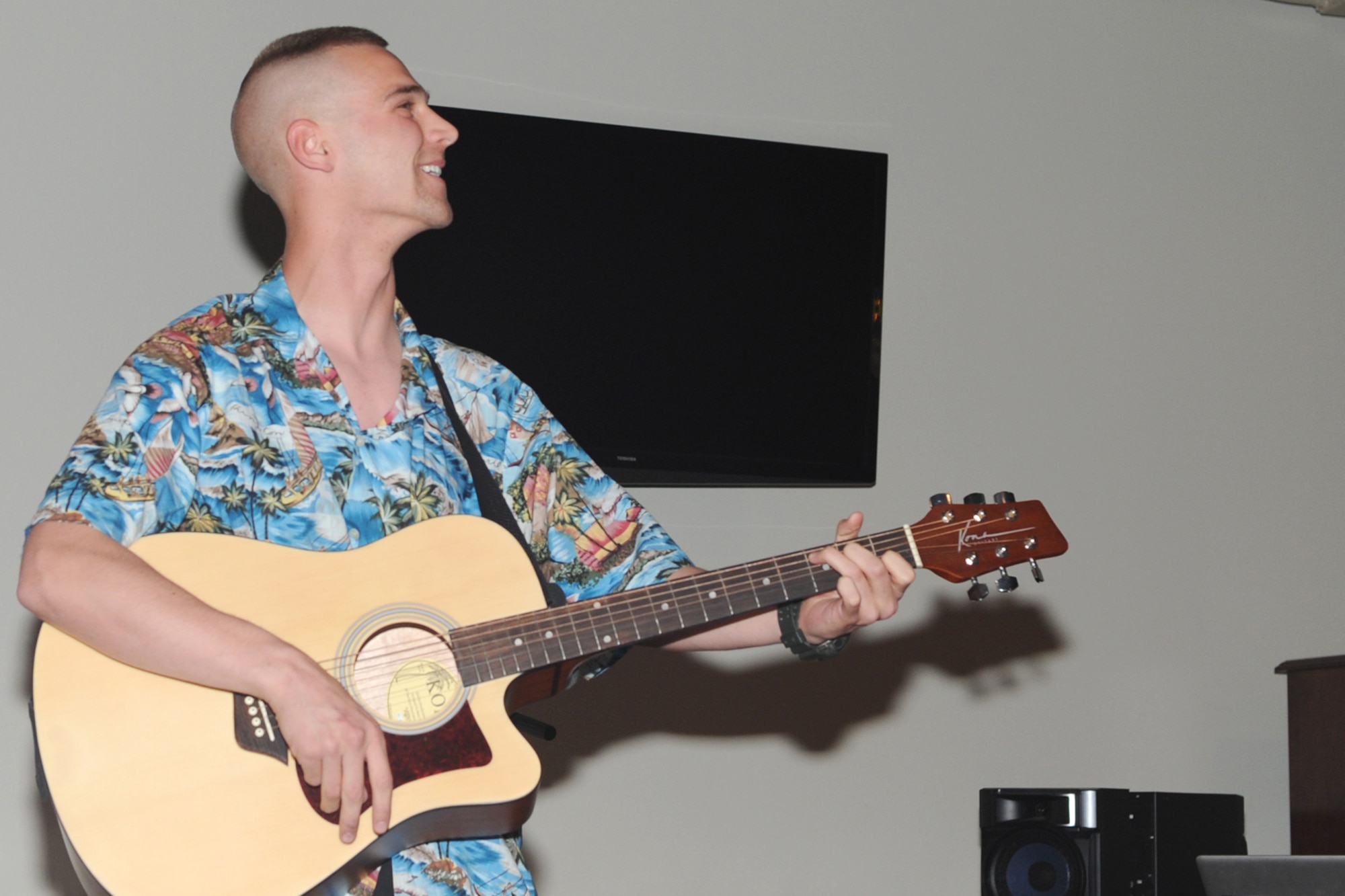 GOODFELLOW AIR FORCE BASE, Texas-- Army Pvt. Kyle Rose, 344th Military Intelligence Battalion student, plays the guitar during the Crossroads talent show on base April 6. More than 100 Team Goodfellow students laughed and cheered during the event. (U.S. Air Force photo/Staff Sgt. Laura R. McFarlane)