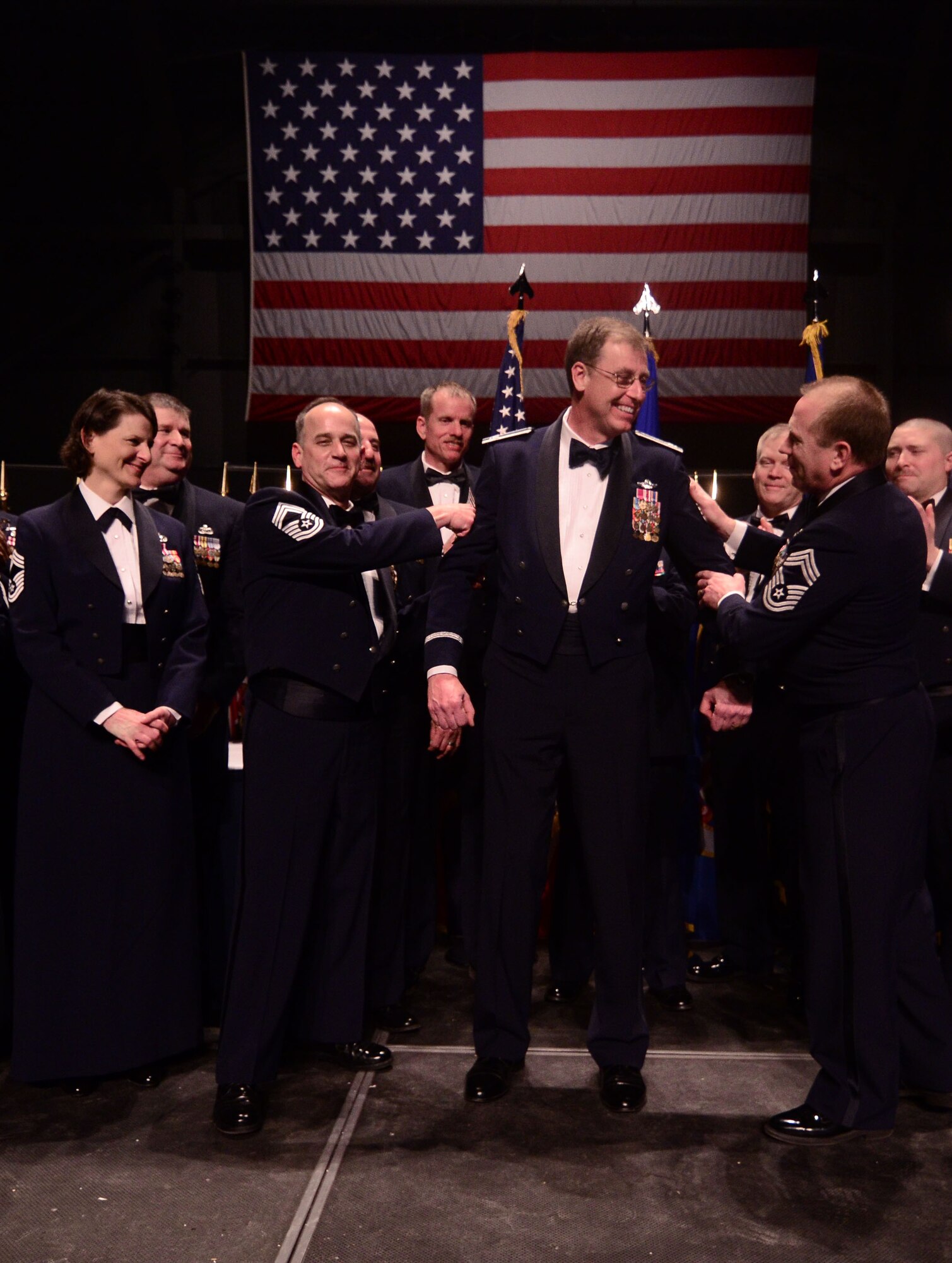 WRIGHT-PATTERSON AIR FORCE BASE, Ohio – The 445th Airlift Wing Chiefs’ Group surprises Col. Stephen Goeman, 445th AW commander, by making him an honorary chief during a short induction ceremony held during the 445th AW Annual Awards Banquet March 9, 2013. (U.S. Air Force photo/Staff Sgt. Mikhail Berlin)