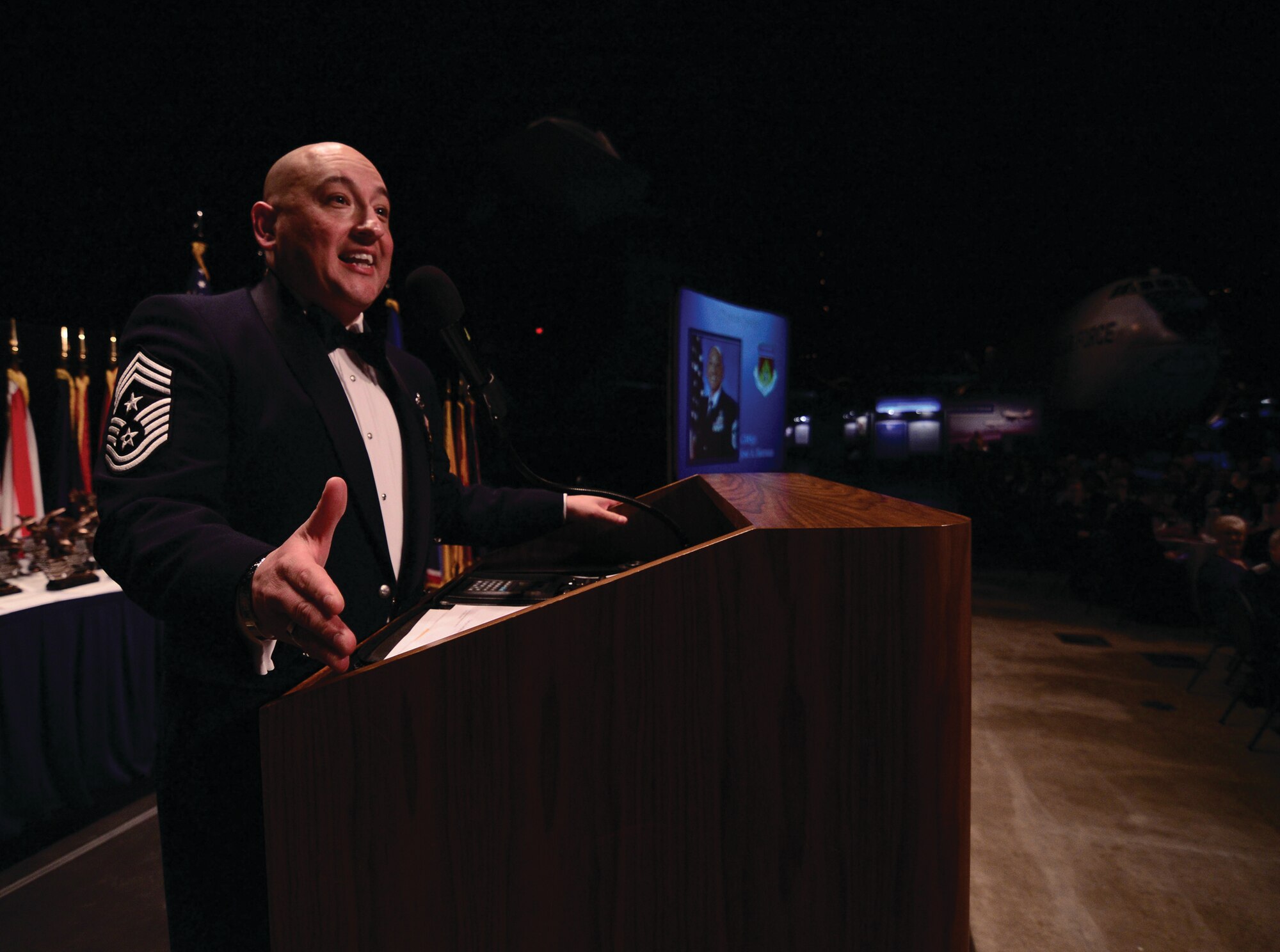 WRIGHT-PATTERSON AIR FORCE BASE, Ohio – Chief Master Sgt. Jose Barraza, 3rd Wing command chief, enlightens the audience as the keynote speaker for the 445th Airlift Wing Annual Awards Banquet held at the National Museum of the U.S. Air Force March 9, 2013. (U.S. Air Force photo/Staff Sgt. Mikhail Berlin)