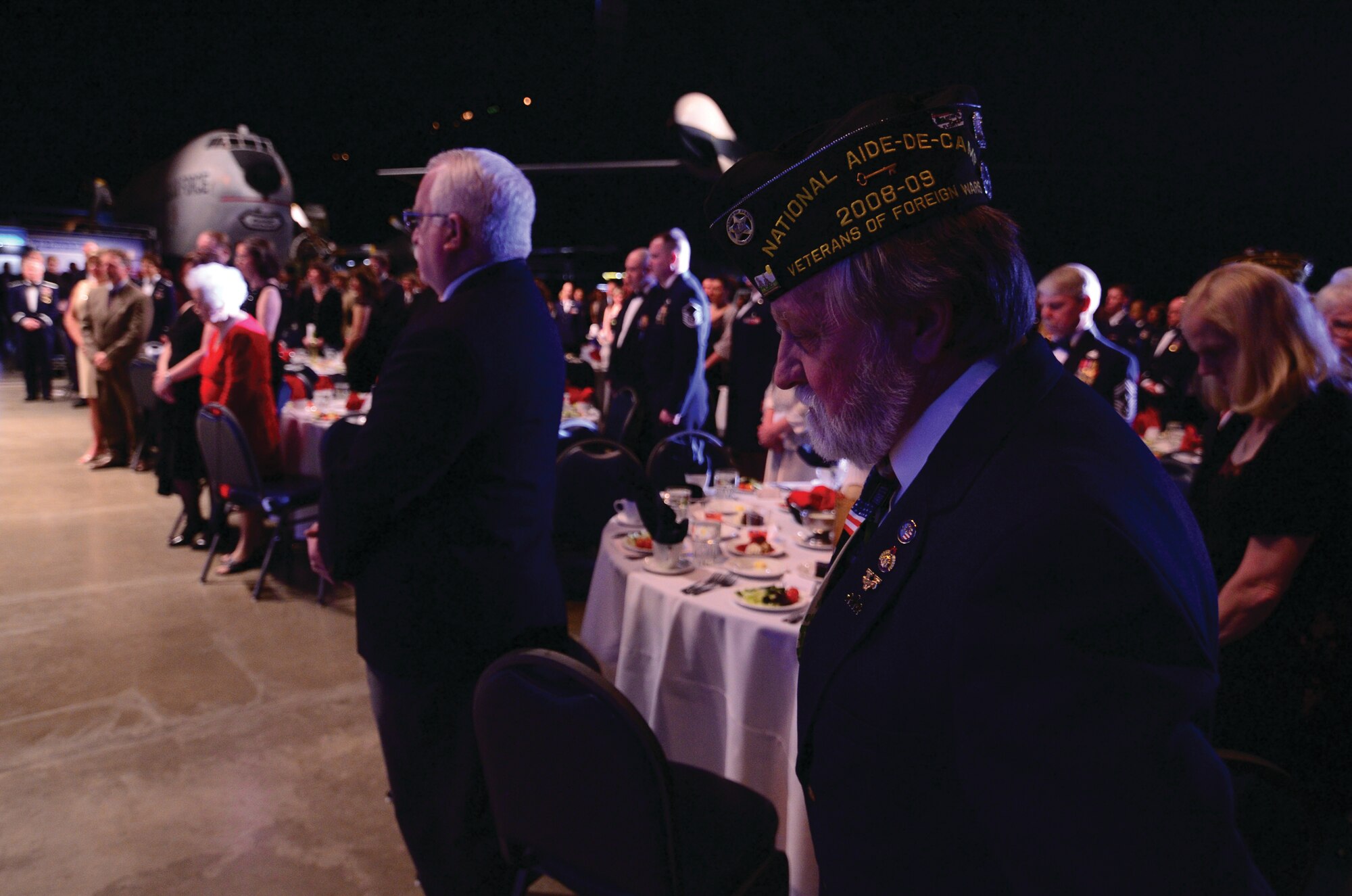 WRIGHT-PATTERSON AIR FORCE BASE, Ohio – A member of the Huber Heights Veterans of Foreign Wars observes a moment of silence during the POW/MIA recognition held during the 445th Airlift Wing Annual Awards Banquet March 9, 2013. (U.S. Air Force photo/Staff Sgt. Mikhail Berlin)