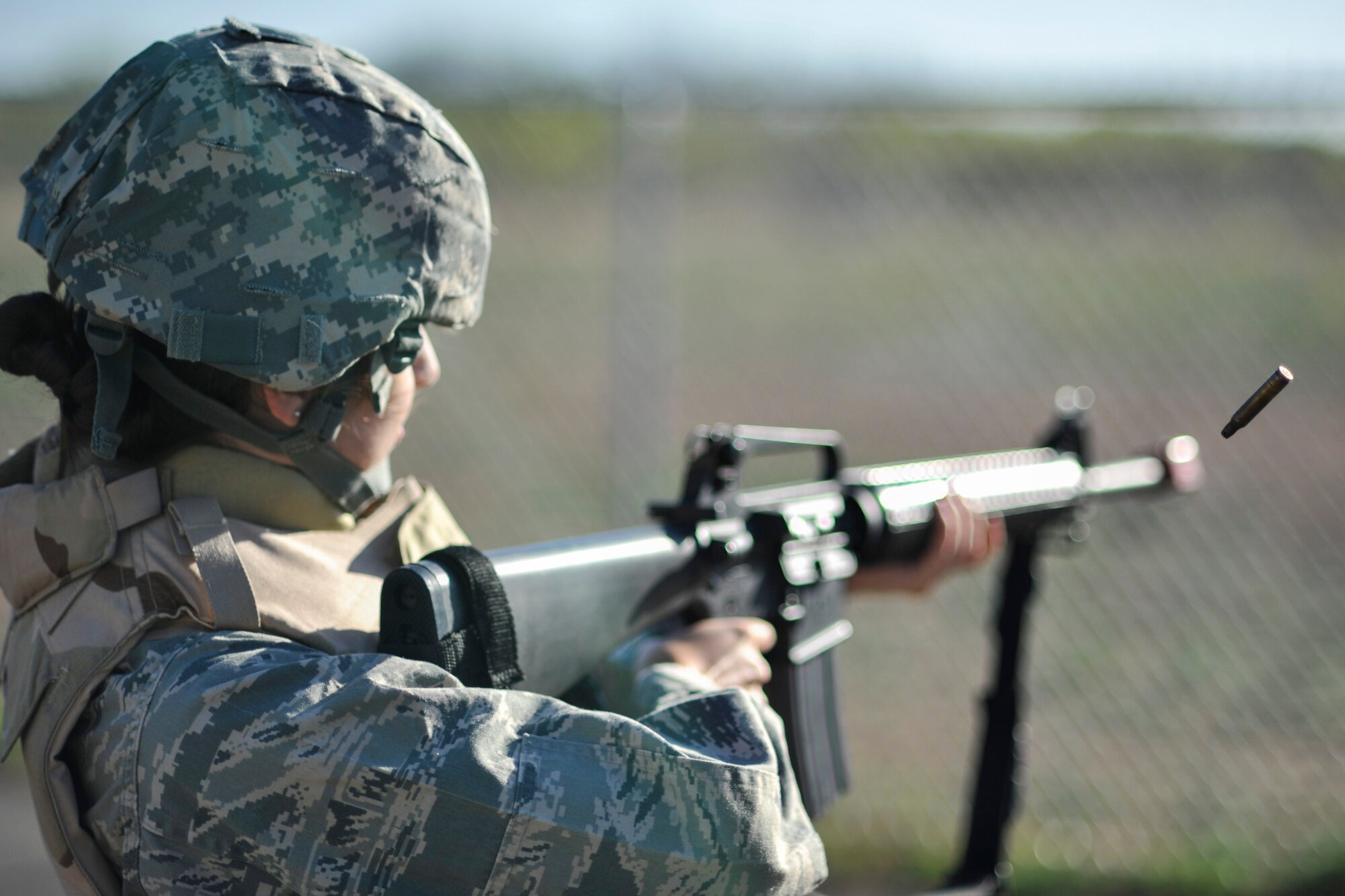 GOODFELLOW AIR FORCE BASE, Texas-- Angelo State University Air Force ROTC Cadet Marhorie Fors fires an M-16 equipped with a blank-firing adapter during a field training exercise at Camp Sentinel April 6. The ASU cadets participated in the training to learn expeditionary war skills from manning an entry control point to searching a detainee. (U.S. Air Force photo/ Airman 1st Class Michael Smith)