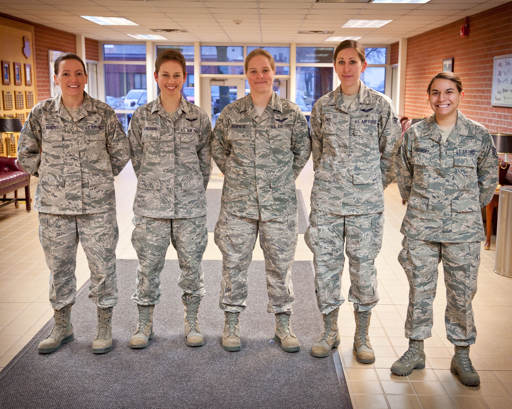 Staff Sgt. Sara Wendt, Senior Airman Jacquelyn Kvilhaug, Tech. Sgt. Lindsay Rosenow, Senior Airman Devon Theis, Staff Sgt. Tonya Jasninsky, and Master Sgt. Rachel Lohmann (not pictured), 934th Aeromedical Evacuation Squadron, performed the flag ceremonies throughout the April Unit Training Assembly weekend at the Minneapolis-St. Paul Air Reserve Station, Minn. (U.S. Air Force photo/Shannon McKay)