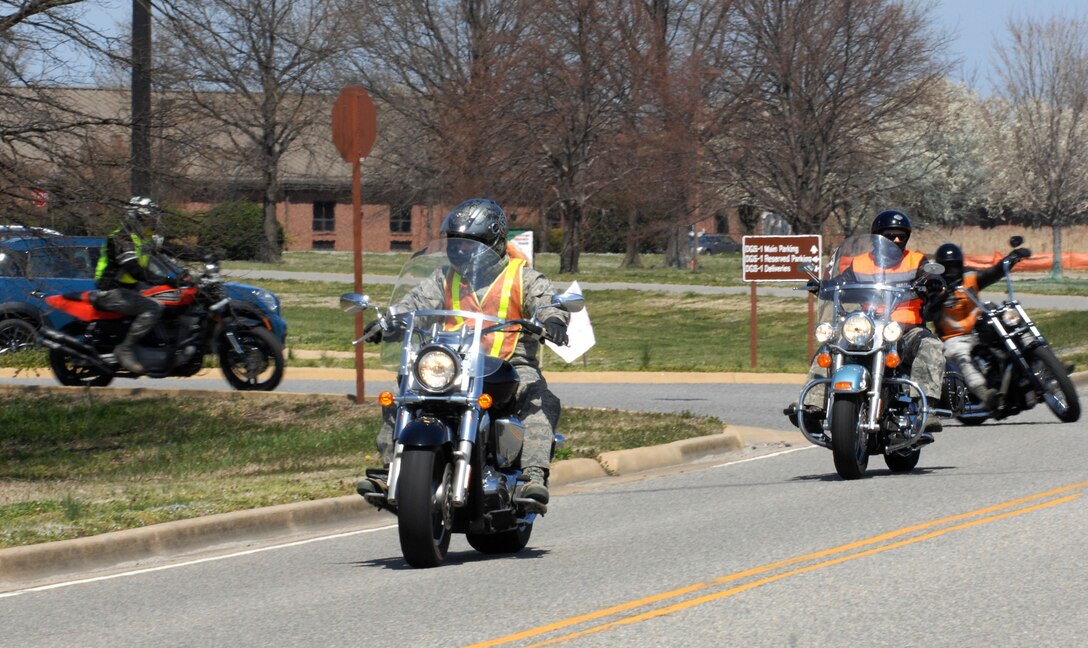 Airmen assigned to the 497th Intelligence, Surveillance and Reconnaissance Squadron participate in a group motorcycle ride during the second annual Sentinel Motorcycle Safety Show hosted by the 497th ISR Group at Langley Air Force Base, Va., April 3, 2013. There were two trophies awarded during the show based on a voting system of the crowd’s favorite in two separate categories: cruiser class and sport class. (U.S. Air Force photo by Staff Sgt. Jeff Nevison/Released)