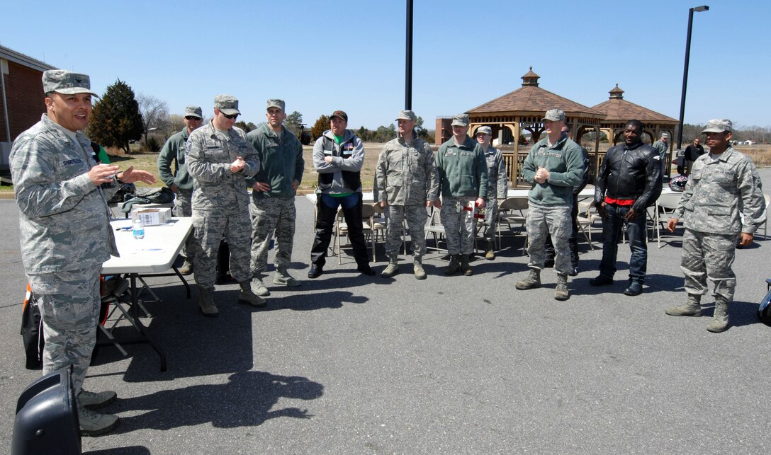 U.S. Air Force Col. Patrick Shortsleeve (left), 497th Intelligence, Surveillance and Reconnaissance Group commander, addresses Airmen during the second annual Sentinel Motorcycle Safety Show at Langley Air Force Base, Va., April 3, 2013. The show was hosted by the 497th ISR Group, but was open to the entire Joint Base Langley-Eustis community. (U.S. Air Force photo by Staff Sgt. Jeff Nevison/Released)