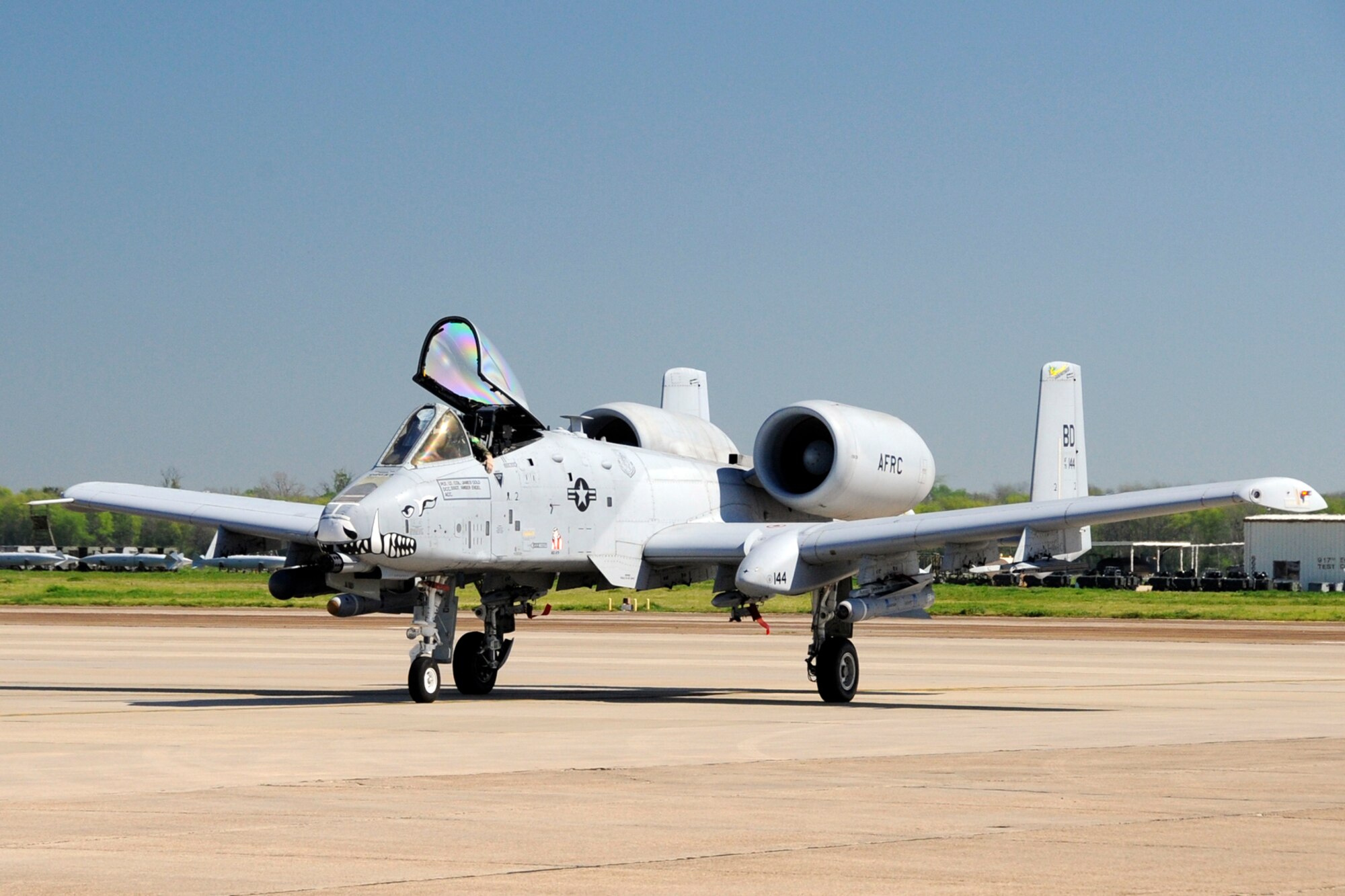 U.S. Air Force Lt. Col. James Gold taxis to a parking spot after his last sortie in an A-10 Thunderbolt II at Barksdale Air Force Base, La., April 5, 2013. Gold participated in a four-ship sortie for his last mission from Barksdale with three other pilots assigned to the 47th Fighter Squadron, who were also making their final flights. (U.S. Air Force photo by Master Sgt. Jeff Walston)    