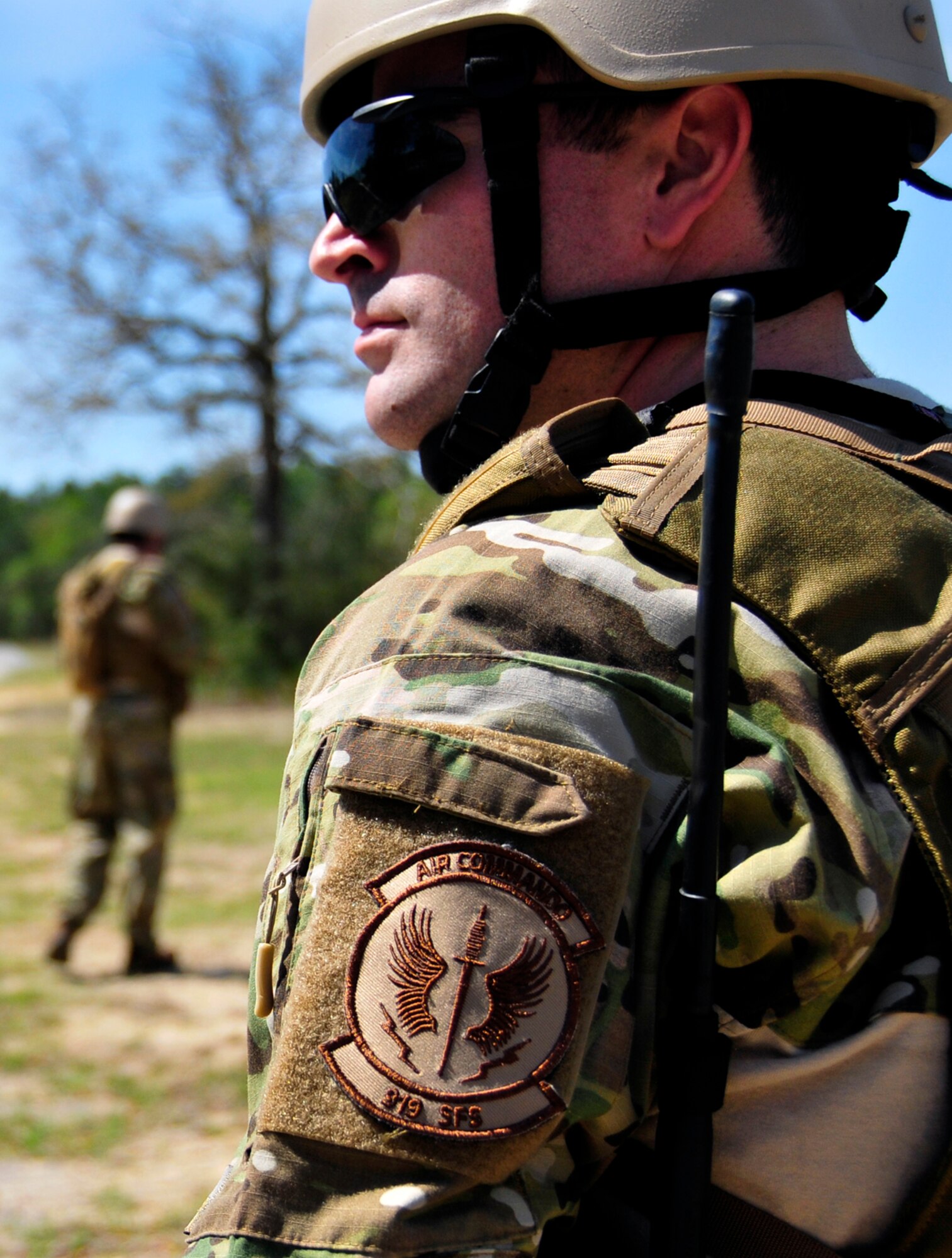 Staff Sgt. Thomas Maloney, of the 919th Security Forces Squadron, watches for threats during an extraction exercise at Duke Field, Fla., April 6. The Security Forces Airmen executed this training exercise with the trainees from the Development and Training Program. The DTP is an Air Force Reserve Command introductory program to help recruits prepare for military life prior to going to basic military training. The trainees were given a first-hand view of the procedures performed to recover American personnel from a downed aircraft in a hostile environment. (U.S. Air Force photo/Tech. Sgt. Cheryl L. Foster)