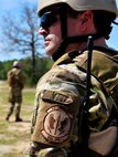 Staff Sgt. Thomas Maloney, of the 919th Security Forces Squadron, watches for threats during an extraction exercise at Duke Field, Fla., April 6. The Security Forces Airmen executed this training exercise with the trainees from the Development and Training Program. The DTP is an Air Force Reserve Command introductory program to help recruits prepare for military life prior to going to basic military training. The trainees were given a first-hand view of the procedures performed to recover American personnel from a downed aircraft in a hostile environment. (U.S. Air Force photo/Tech. Sgt. Cheryl L. Foster)