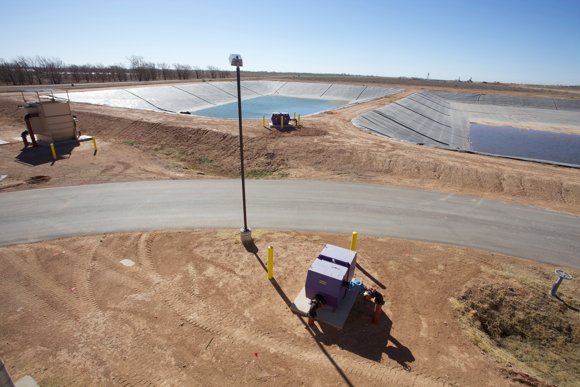 CANNON AIR FORCE BASE, N.M. -- These new holding ponds near the wastewater treatment plant here increase the base's effluent capacity from 190,000 gallons
to 9 million gallons. The base will use the water for construction and
irrigation. (U.S. Air Force photo/Eddie Green)
