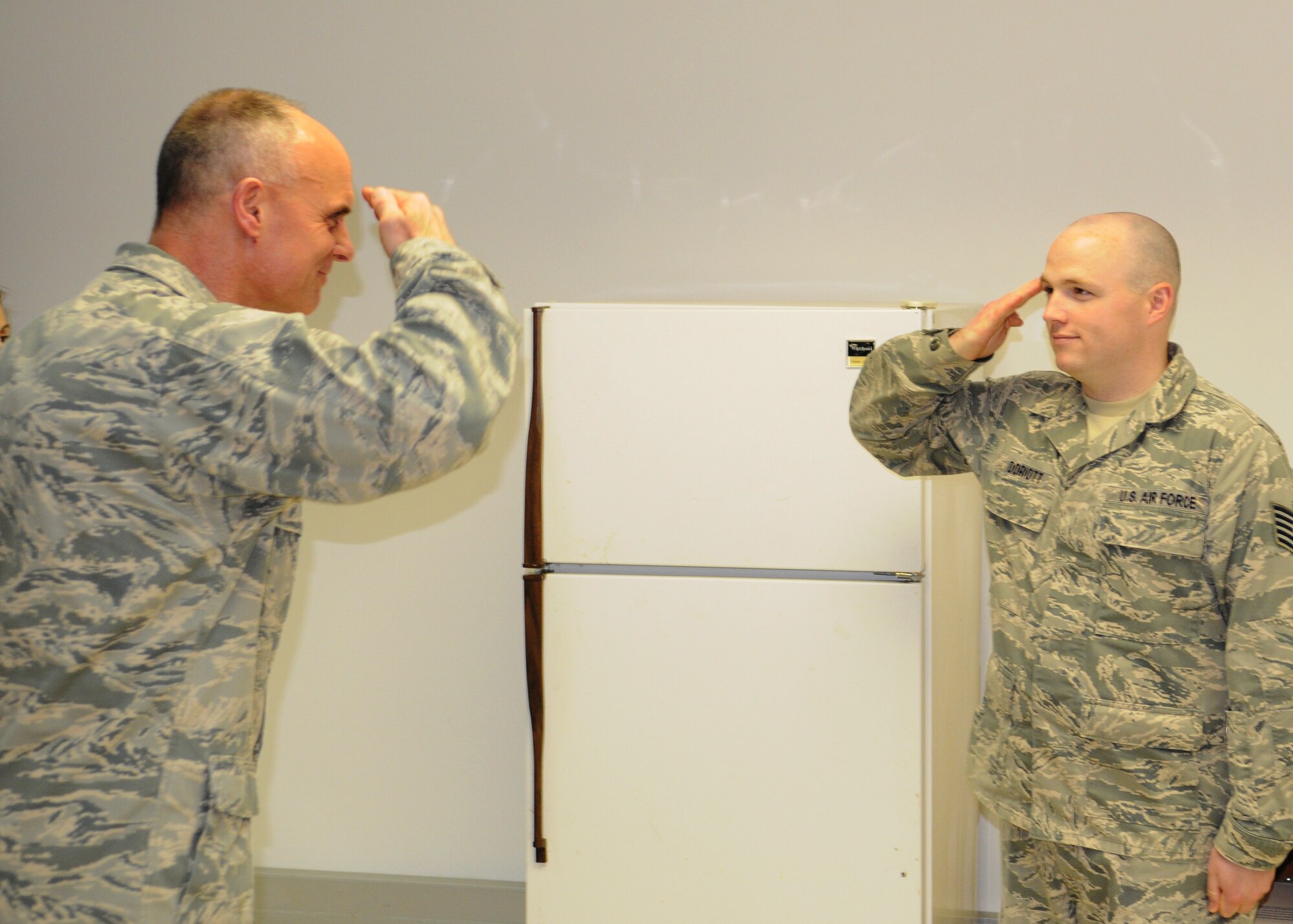Lt. Gen. Craig A. Franklin, 3rd Air Force and 17th Expeditionary Air Force commander, talks with Tech. Sgt. Derek Doriott, 351st Expeditionary Air Refueling Squadron, Communications Focal Point NCOIC, April 8, 2013, about the support the communications focal point offers deployed members in Southwest Europe. Doriott, who is from Webster, Wis., was recognized, along with the rest of his duty section for their hard work keeping the 351st EARS connected while away from their home stations. (U.S. Air Force photo by 1st Lt. Christopher Mesnard/Released)