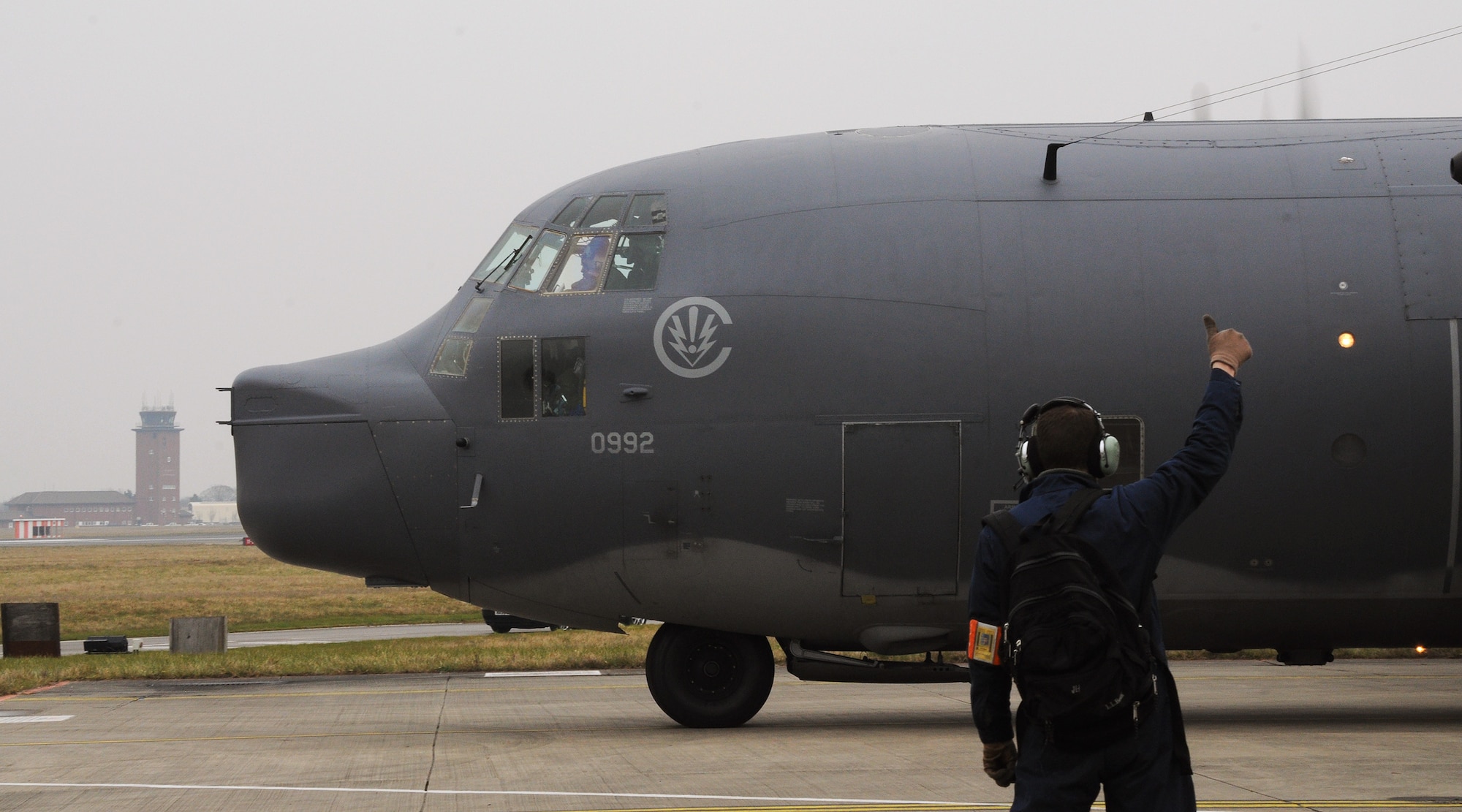 The 67th Special Operations Squadron aircrew of MC-130P Combat Shadow 65-0992 start a final taxi before the aircraft's departure from RAF Mildenhall, England, March 8, 2013, to Davis-Monthan Air Force Base, Ariz., where it is being retired from active service. After 47 years of rescue, humanitarian and special operations service, this aircraft's retirement marks the dawn of a transition to new special operations aircraft in the European theater. (U.S. Air Force photo by Staff Sgt. Thomas Trower/Released)