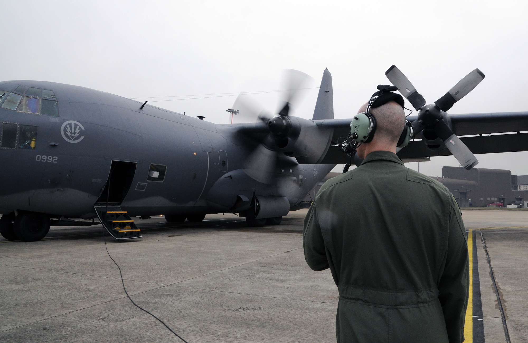 The 67th Special Operations Squadron aircrew of MC-130P Combat Shadow 65-0992 start engines before the aircraft's final departure from RAF Mildenhall, England, March 8, 2013, enroute to Davis-Monthan Air Force Base, Ariz., where it is being retired from active service. After 47 years of rescue, humanitarian and special operations service, this aircraft's retirement marks the dawn of a transition to new special operations aircraft in the European theater. (U.S. Air Force photo by Staff Sgt. Thomas Trower/Released)