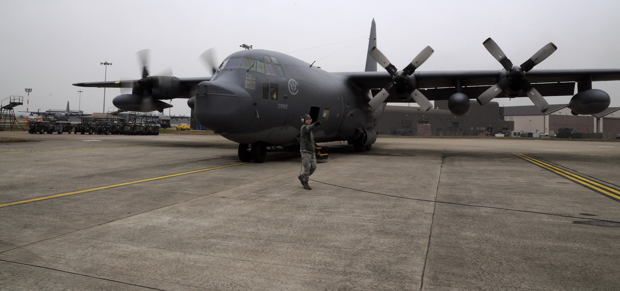 The 67th Special Operations Squadron aircrew of MC-130P Combat Shadow 65-0992 start engines before the aircraft's final departure from RAF Mildenhall, England, March 8, 2013, en route to Davis-Monthan Air Force Base, Ariz., where it is being retired from active service. After 47 years of rescue, humanitarian and special operations service, this aircraft's retirement marks the dawn of a transition to new special operations aircraft in the European theater. (U.S. Air Force photo by Staff Sgt. Thomas Trower/Released)