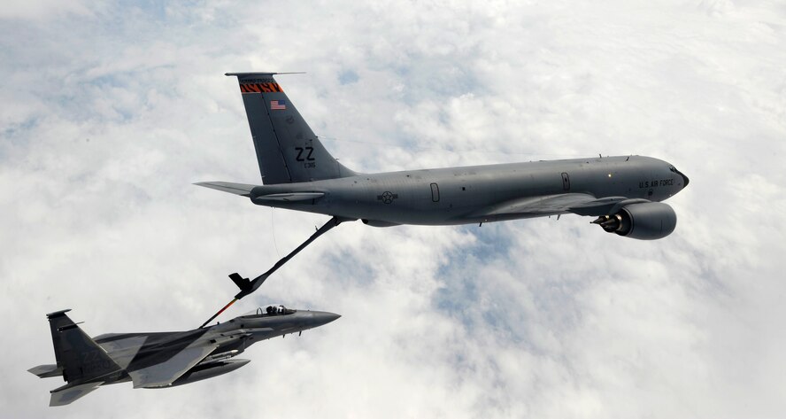 A U.S. Air Force KC-135 Stratotanker aerial refueling aircraft from the 909th Air Refueling Squadron refuels a 44th Fighter Squadron F-15 Eagle during a training mission over Okinawa, Japan, April 5, 2013. The KC-135 and F-15 are two of five aircraft regularly operated from Kadena Air Base. (U.S. Air Force photo/Senior Airman Maeson L. Elleman)