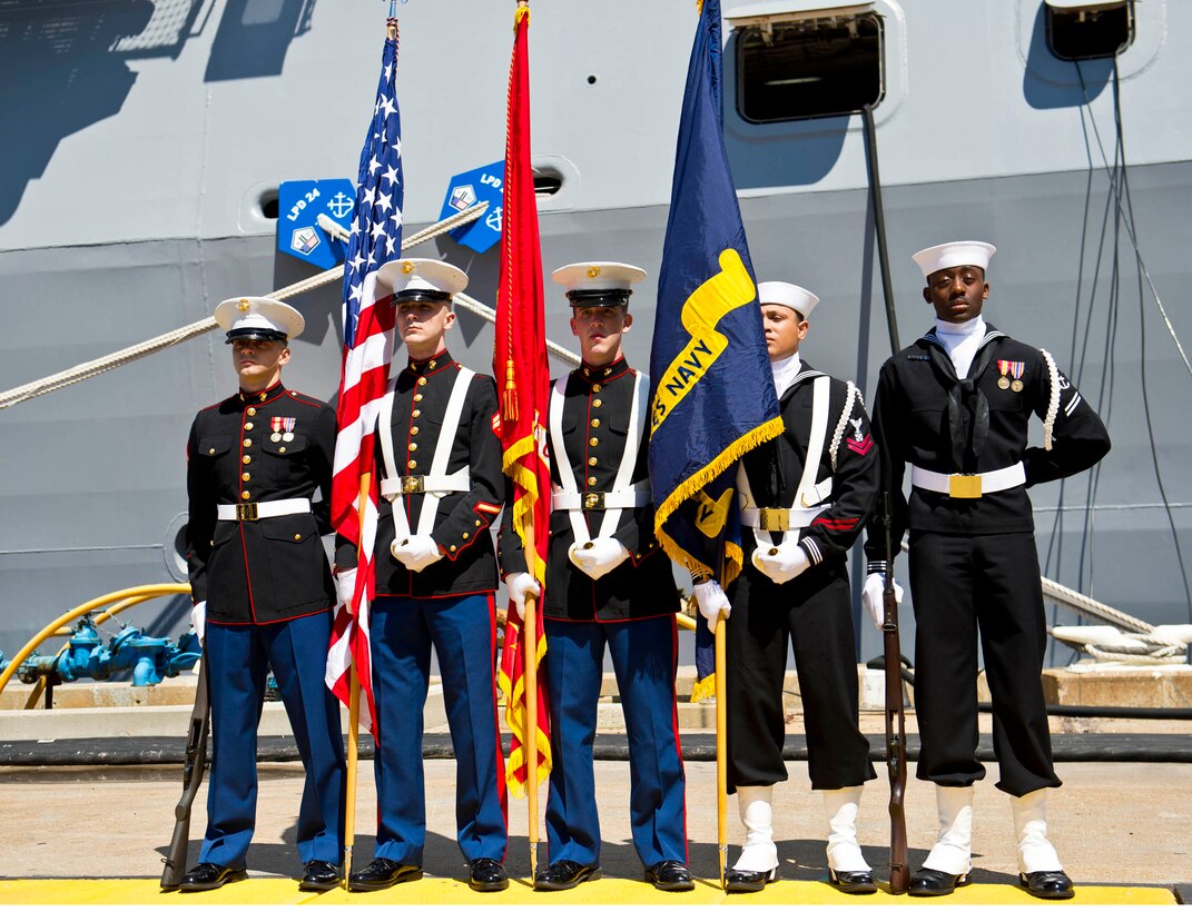 Members the color guard assigned to the newly commissioned amphibious