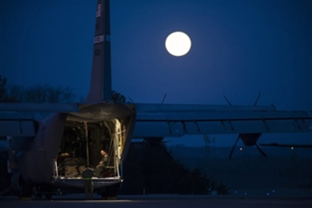 U.S. Air Force airmen from the 19th Airlift Wing prepare a C-130J Hercules for a flight at Little Rock Air Force Base, Ark., on March 27, 2013.  The 19th Wing's responsibilities range from supplying humanitarian airlift relief to victims of disasters, to airdropping supplies and troops into the heart of contingency operations in hostile areas.  