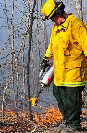 Quantico Fire Department and Emergency Rescue Services responded to a fire crawling through the woods in Training Area 11 on the west side of Marine Corps Base Quantico on April 9, 2013. The affected area was too large to extinguish outright so emergency responders limited the spread of the fire by bulldozing a "no burn" zone around it. After the zone had been crafted, firefighters fought fire with fire by "back-burning", a controlled burn designed to rob the fire of fuel so it can be managed safely.