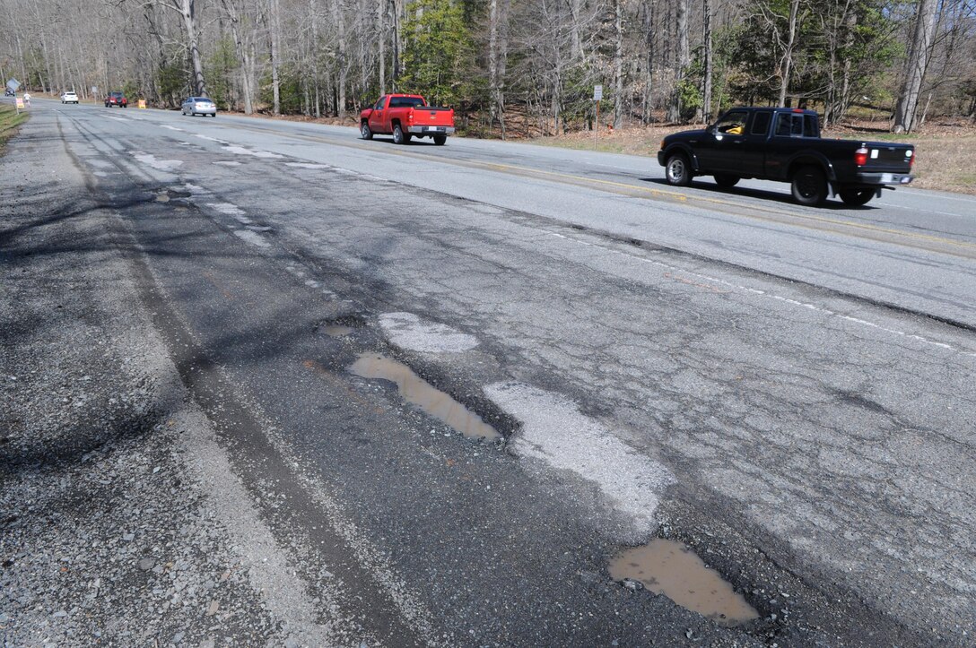 The winter was cruel to the blacktop on Russell Road, and now the length of road near the Davis Center is unkind to vehicles. This worst stretch is about to be repaved, in advance of the road widening to come in late summer and early fall.