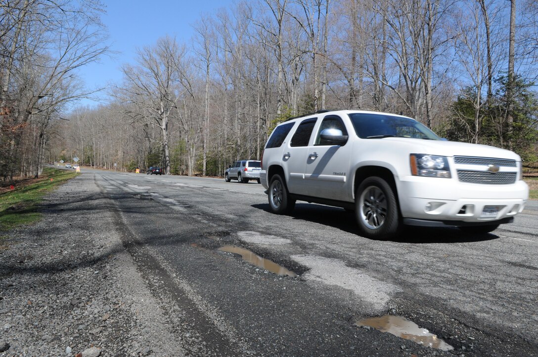 The winter was cruel to the blacktop on Russell Road, and now the length of road near the Davis Center is unkind to vehicles. This worst stretch is about to be repaved, in advance of the road widening to come in late summer and early fall.