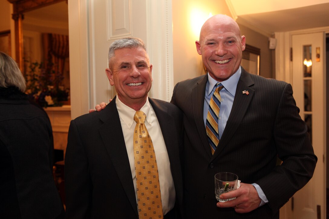 Maj. Gen. Thomas M. Murray, the Commanding General of Training and Education Command, and Sgt. Maj. Micheal P. Barrett, the 17th Sergeant Major of the Marine Corps, attend a farewell reception in honor of Gen. John R. Allen and Gen. James N. Mattis, at the Home of the Commandants. Marine Barracks Washington, D.C., on April 4, 2013. (U.S. Marine Corps photo by Sgt. Marionne T. Mangrum)