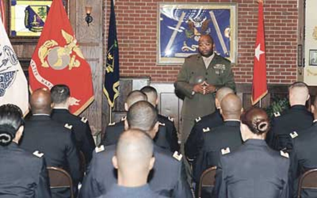 Marine Chief Warrant Officer 5 Domah Diggs, CBRN Warrant Officer Basic Course director, addresses recent graduates of the Interservice Training Review Organization-Chemical, Biological, Radiological, Nuclear Warrant Officer Basic Course.