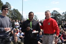 HMLA-167 celebrated it's 45th year of existance aboard Marine Corps Air Station New River, March 28. The first slice of the cake was presented by  Lt. Col. Shawn J. Hughes, commanding officer of HMLA-167, to the Marine who had been a part of the squadron the longest, Gunnery Sgt. Zabdiel Hamilton, the quality assurance division chief for HMLA-167.
