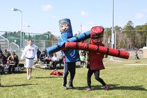 HMLA 167 Marines joust during the squadron's birthday celebration, March 28. Jousting was one of seven competitions the squadron held during the event. 