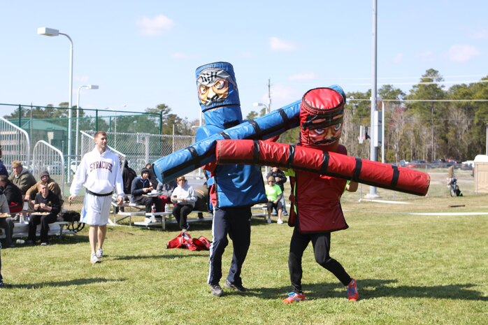 HMLA 167 Marines joust during the squadron's birthday celebration, March 28. Jousting was one of seven competitions the squadron held during the event. 