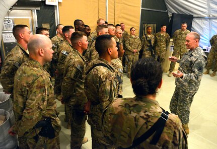 Gen. Martin E. Dempsey, chairman of the Joint Chiefs of Staff, talks with service members at Forward Operating Base Sharana, April 7, 2013.