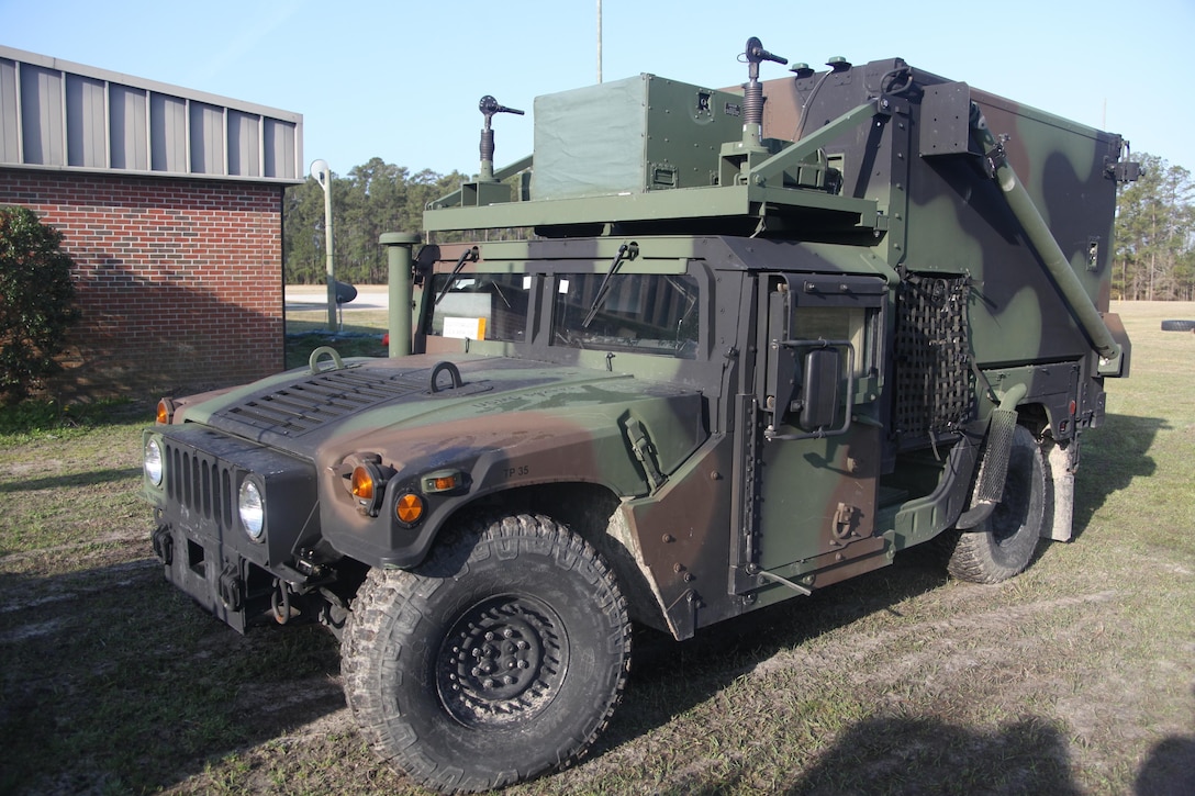A section leader’s vehicle equipped with a Joint Range Extension system sits at the battery headquarters April 9. The JRE System is used to send air pictures from the section leader to his fire teams. Air pictures are readouts sent to the leader’s vehicle from satellites, Air Force aircraft and even Marine Corps ground radar systems, and gives the section leaders a better eye on what is in the local area both friendly and enemy.