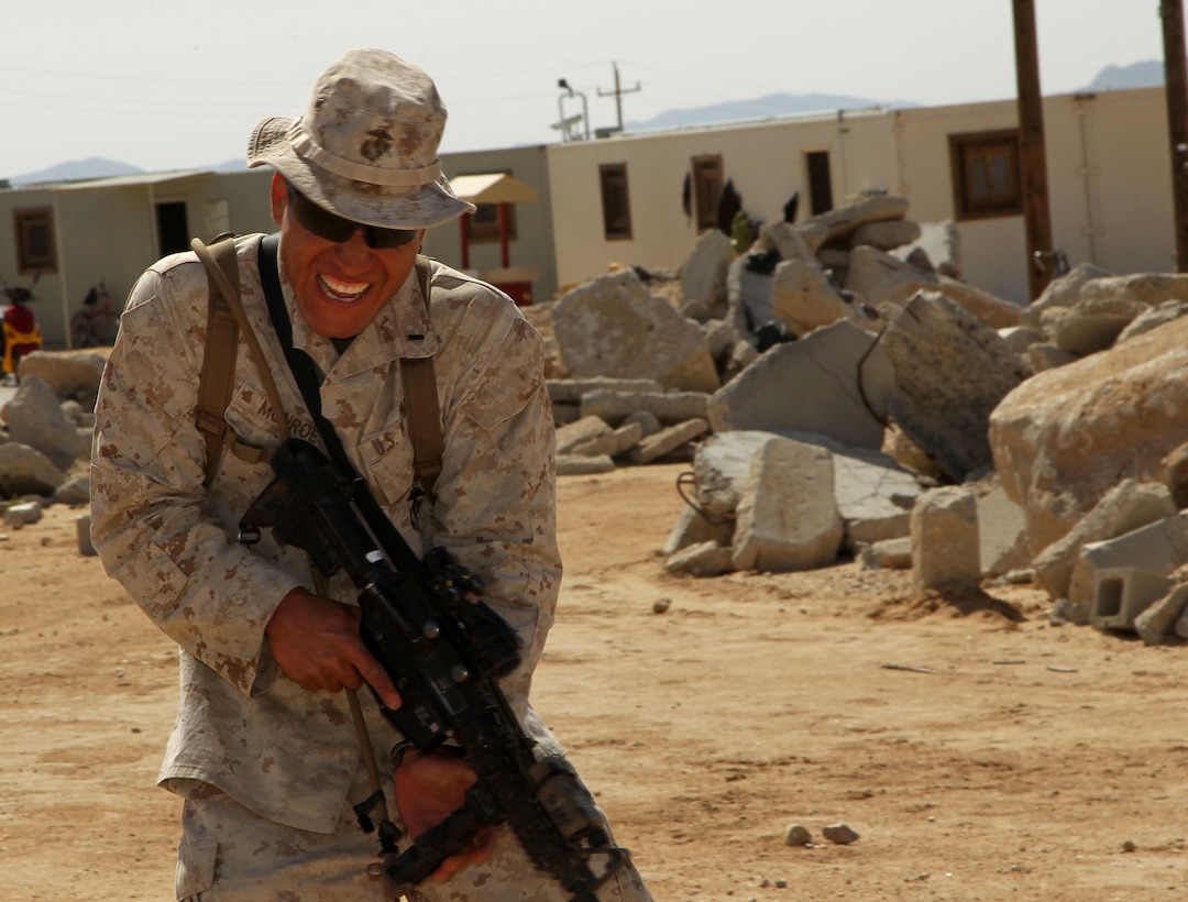 1st Lt. Seth Monroe, company comander, Headquarters and Service Company, Combat Logistics Battalion 7, gets hit by heat emitting millimeter waves resonating from the Active Denial System 2 at the Combat Center’s Range 800 March 21, 2013.