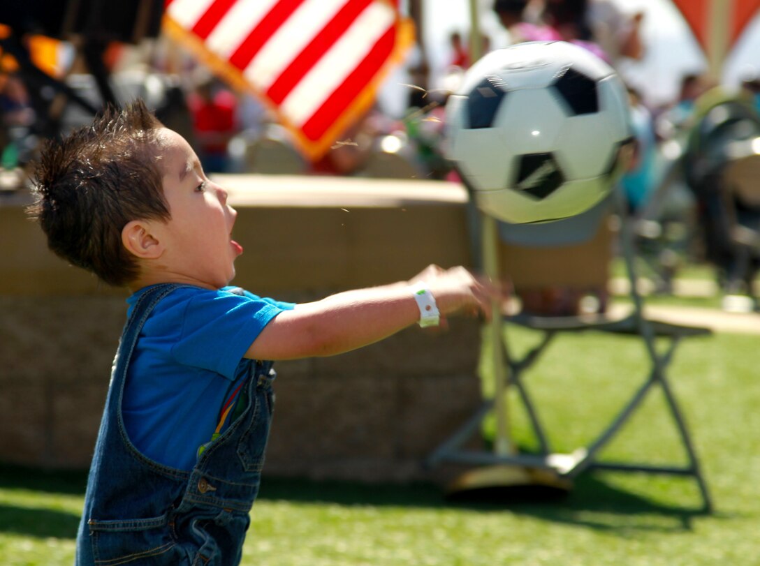 Mathew Pimentel, 2, son of Lance Cpl. Eric Pimentel, plays soccer during Marine Unmanned Aerial Vehicle Squadron 3’s squadron party. 