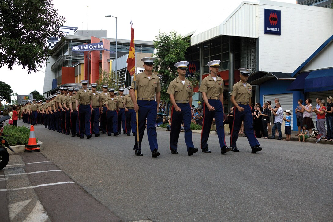 Marines and sailors march through central Darwin, Australia, as part of the ANZAC Day parade April 25. ANZAC Day commemorates the anniversary of the landing of the Australian and New Zealand Army Corps on the shores of Gallipoli during World War I and has become a holiday in Australia and New Zealand to honor veterans of the Australian and New Zealand defence forces. The Marines are with Company F, 2nd Battalion, 3rd Marine Regiment, 3rd Marine Division, III Marine Expeditionary Force.