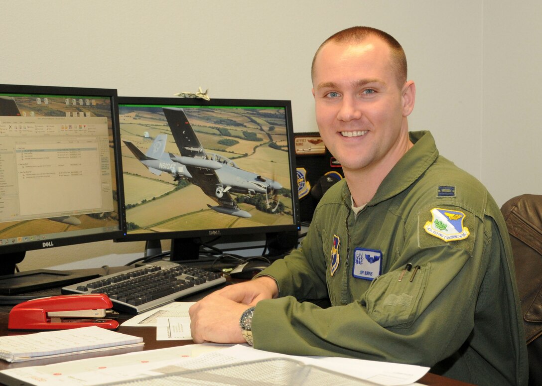 Capt. Jeffrey Burns, 47th Student Squadron phase one flight commander, poses for a picture April 10 after being awarded the Spirit of Hope Award for Air Education and Training Command at Laughlin Air Force Base, Texas. Burns earned the award, which was named in honor of Bob Hope, the famous actor, comedian and long-time military supporter, because of his selfless commitment to service to the Laughlin and Del Rio communities. (U.S. Air Force photo/2nd Lt. Evan M. Ross)