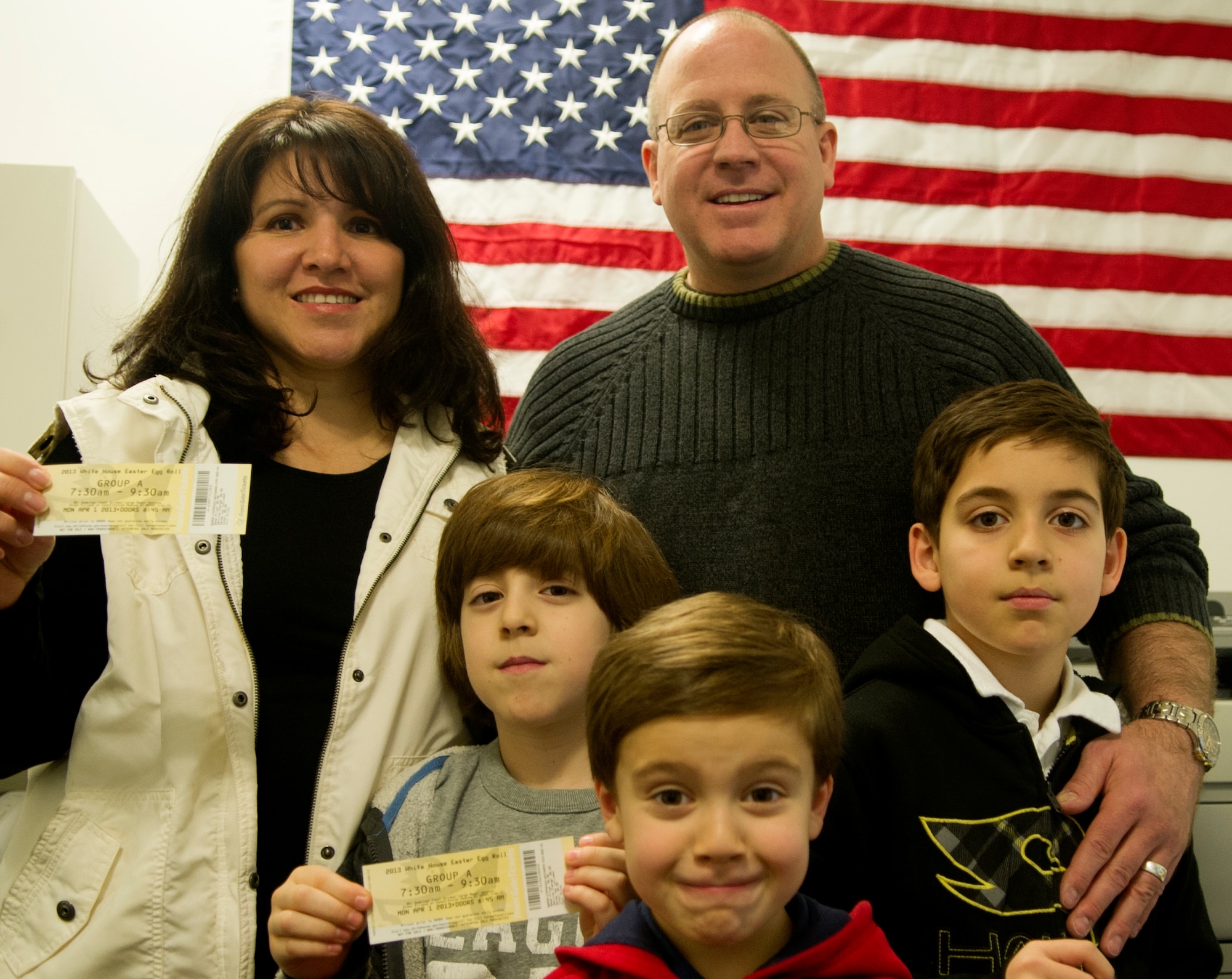 Col. Jeffrey King, an Air Force District of Washington Airmen who is on R&R from his current deployment, picks up tickets for the White House Easter Egg Roll with his family March 27, 2013, at Joint Base Andrews, Md.  Because King’s R&R ended shortly after the pickup, he was not able to attend the actual event with his family.  AFDW Airmen who deployed in the last 12 months, or are currently deployed, qualified for the opportunity for their family to attend the event. (U.S. Air Force photo by 1st Lt. Ashleigh Peck) 