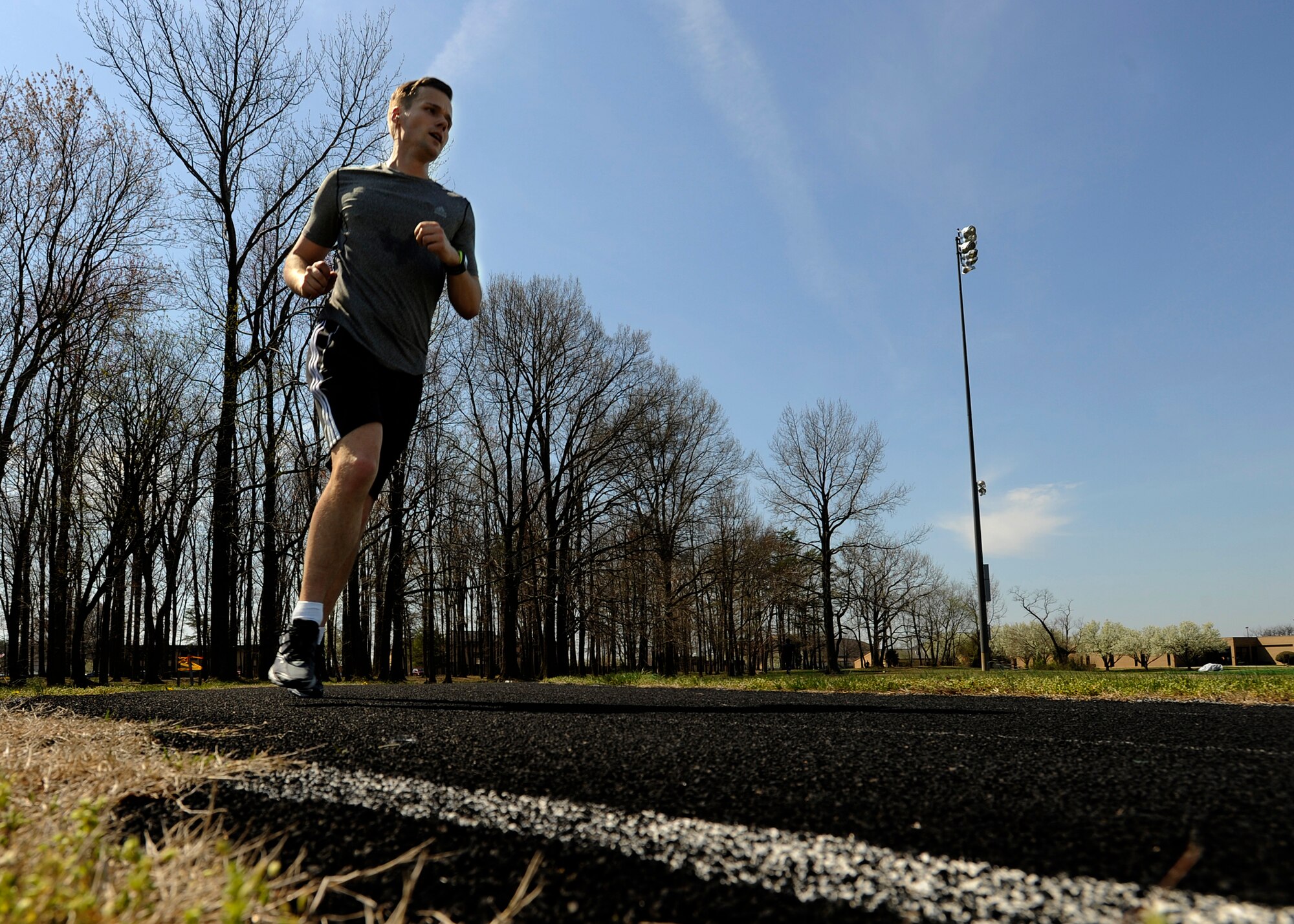 Staff Sgt. David Nicholson, 779th Aerospace Medical Squadron NCO in charge of presidential support, runs multiple times a week during his lunch-hour in preparation for the upcoming Joint Base Andrews Half Marathon taking place April 20, 2013. Nicholson ran his first half marathon in Seoul, South Korea and said he knew that running would always be part of his life when he crossed the finish line that day. (U.S. Air Force photo/Staff Sgt. Brittany E. Jones)