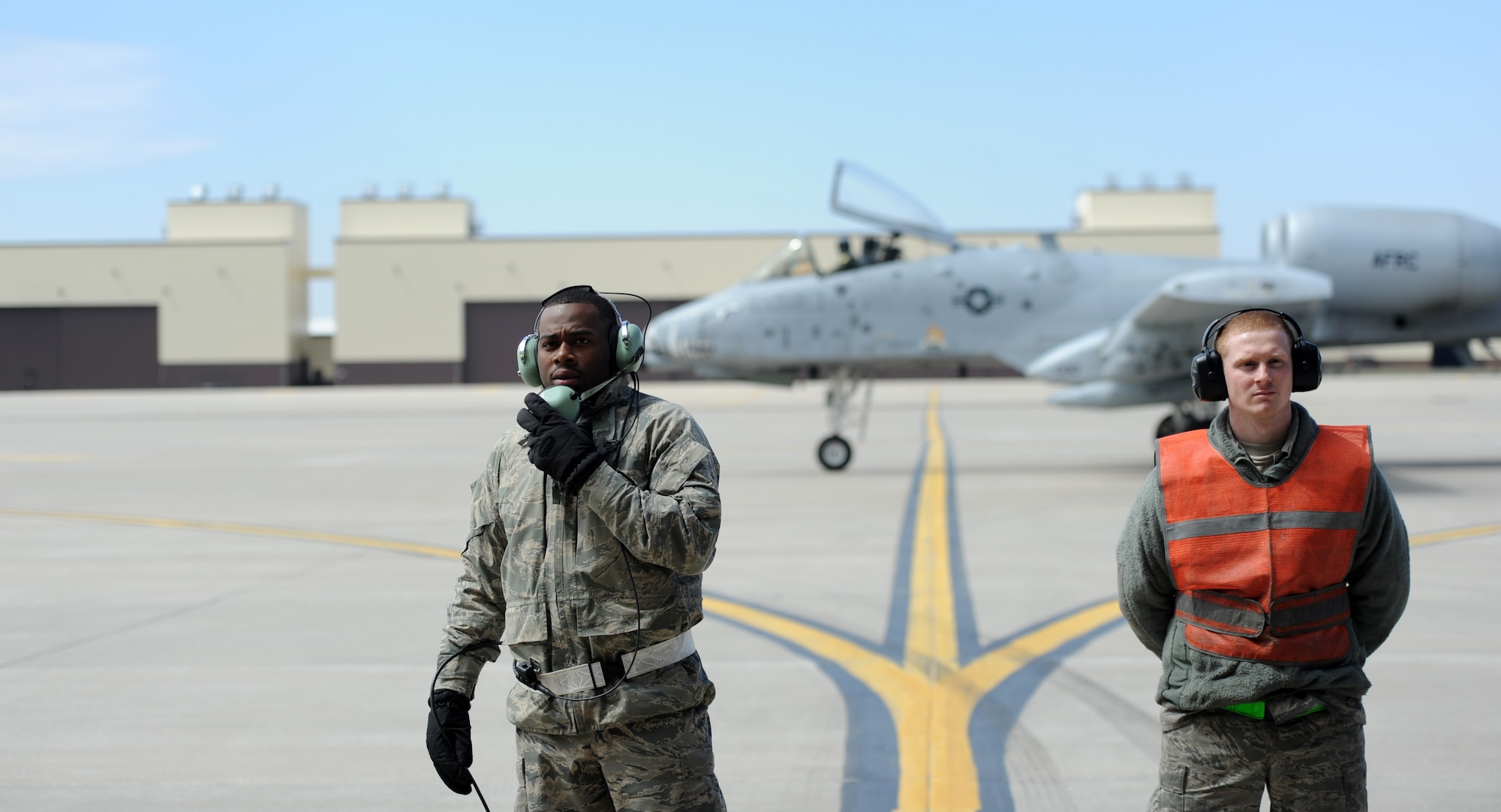 Airman 1st Class Steven McCray, 13th Aircraft Maintenance Unit B-2 Spirit crew chief, and Airman 1st Class James Fulton, 13th Aircraft Maintenance Unit B-2 crew chief, perform pre-flight checks at Whiteman Air Force Base, April 5, 2013.  Fulton and McCray are two of more than 160 crew chiefs that are responsible for ensuring each B-2 assigned to Whiteman Air Force Base is mission ready. (U.S. Air Force photo by Staff Sgt. Nick Wilson/Released)