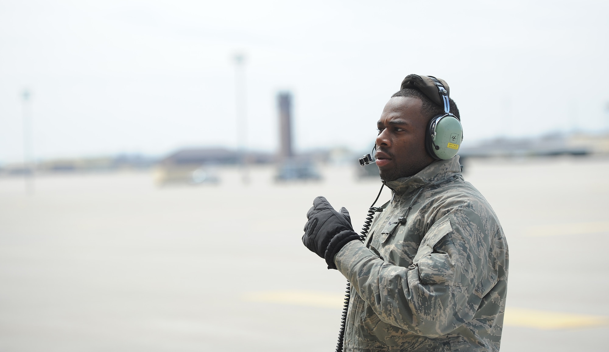 Airman 1st Class Steven McCray, 13th Aircraft Maintenance Unit B-2 Spirit crew chief, communicates with pilots during a pre-flight inspection, Whiteman Air Force Base, April 5, 2013. Crew chiefs from the 509th Aircraft Maintenance Squadron are responsible for inspecting, troubleshooting and maintaining Whiteman's B-2 Spirits, ensuring the aircraft are combat- ready to support global strike operations and nuclear deterrence. (U.S. Air Force photo by Staff Sgt. Nick Wilson/Released)
